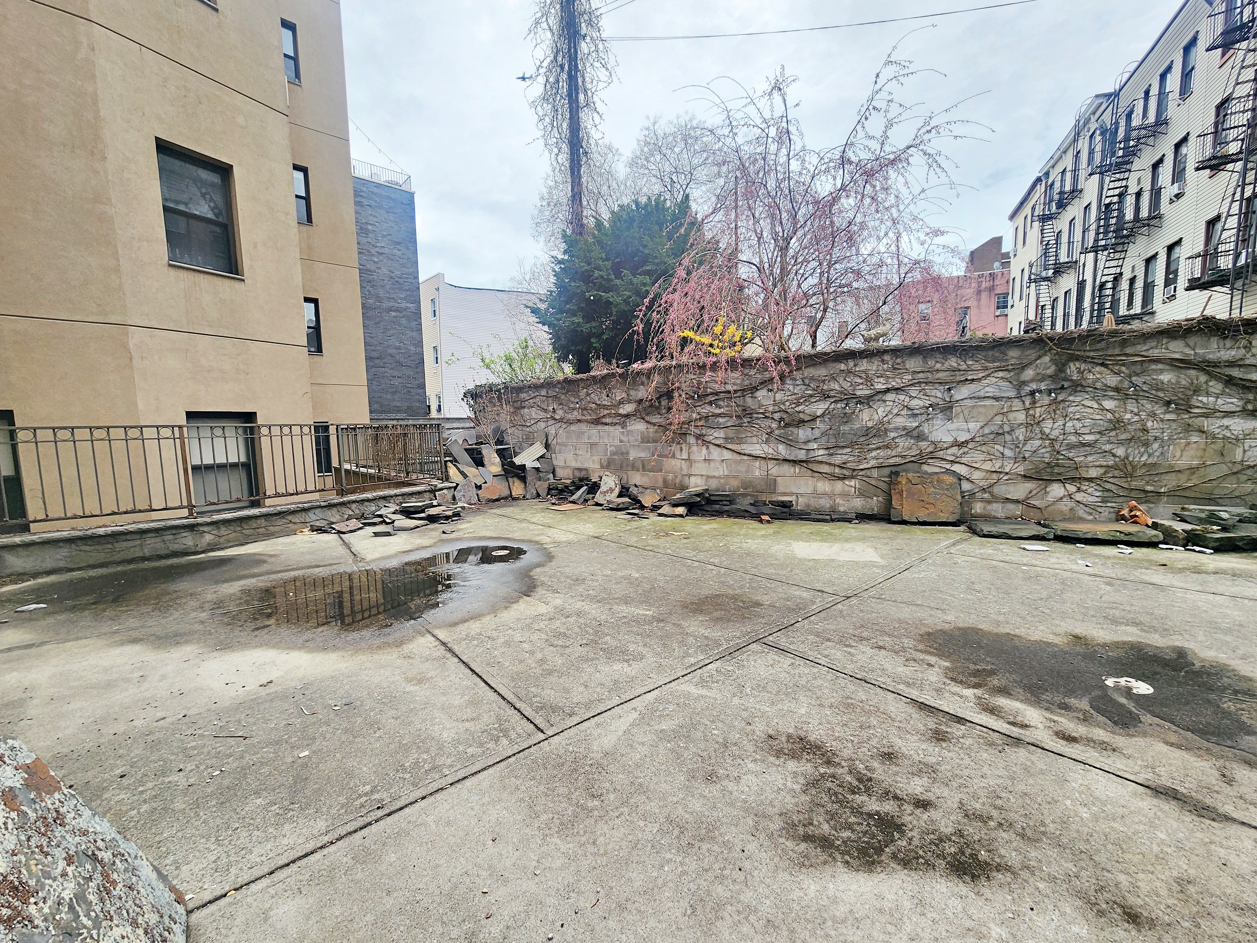 258 Devoe Street, Unit 1 Brooklyn, NY 11211 - Photo 2 of 12 a view of a terrace with a bench