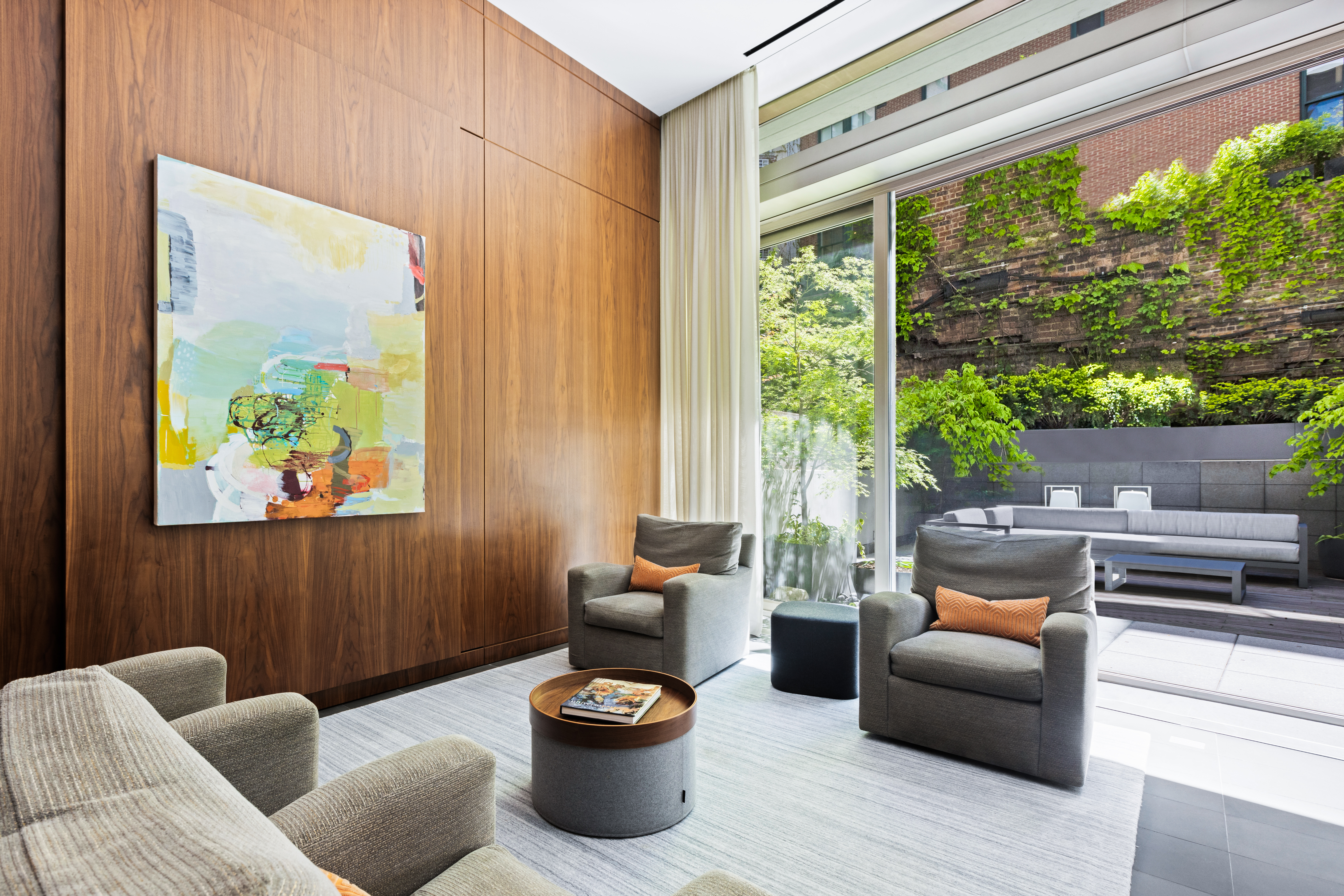 33 Vestry Street, Unit TH1 Manhattan, NY 10013 - Photo 3 of 17 a living room with furniture and a window