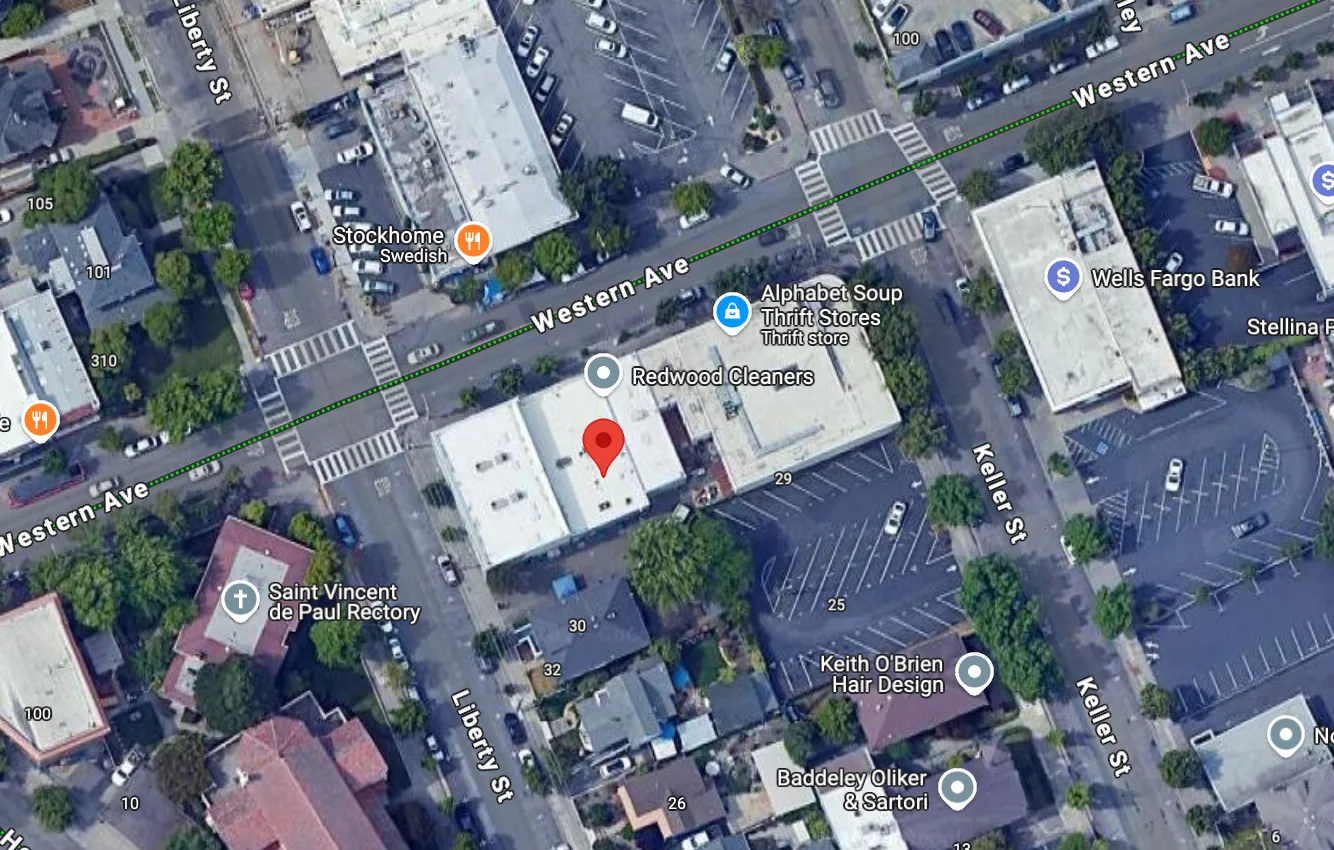 a view of a car parked in front of a building