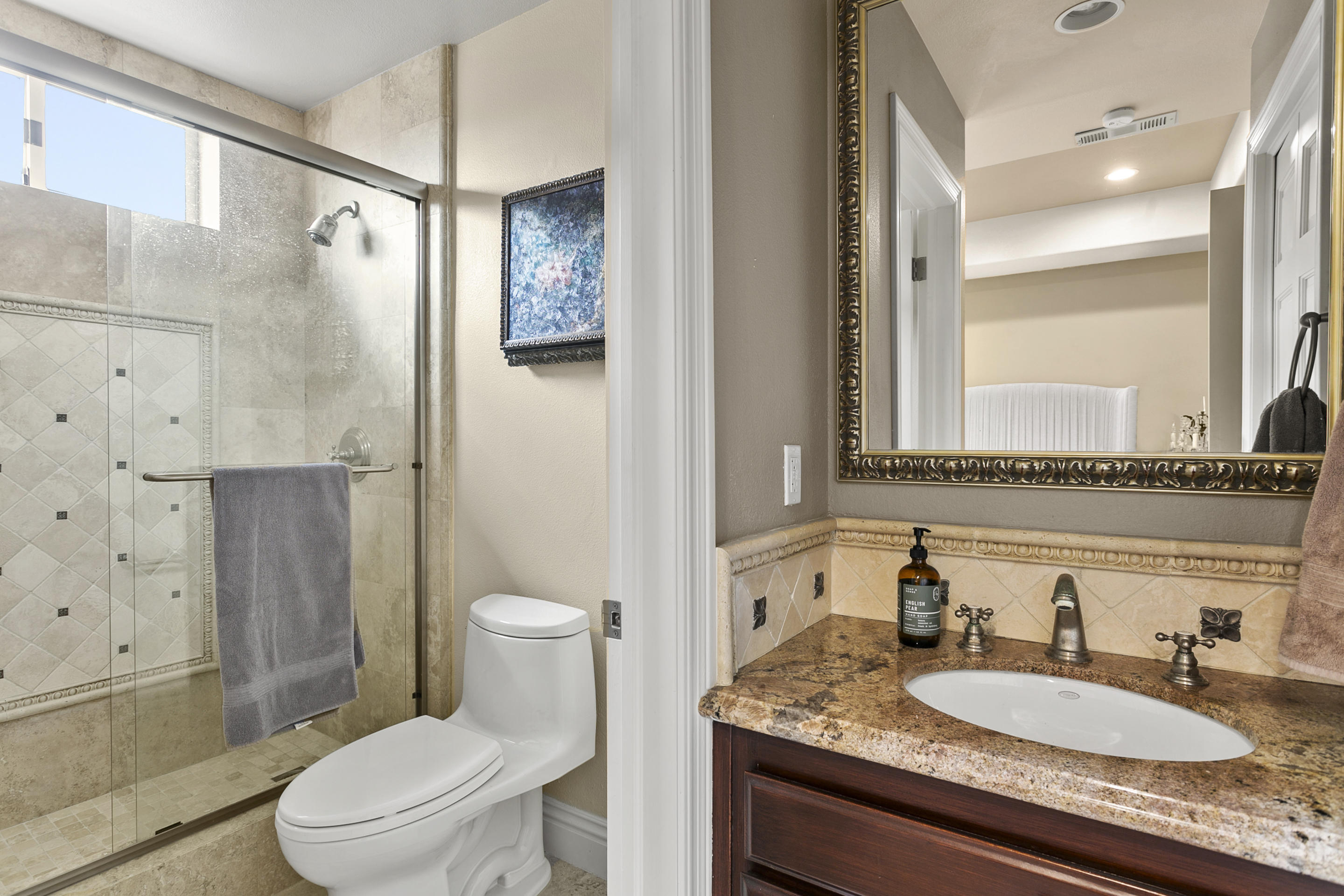 10 Vista Montemar Laguna Niguel, CA 92677 - Photo 16 of 67 a bathroom with a granite countertop sink toilet and shower