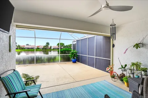 a swimming pool with potted plants