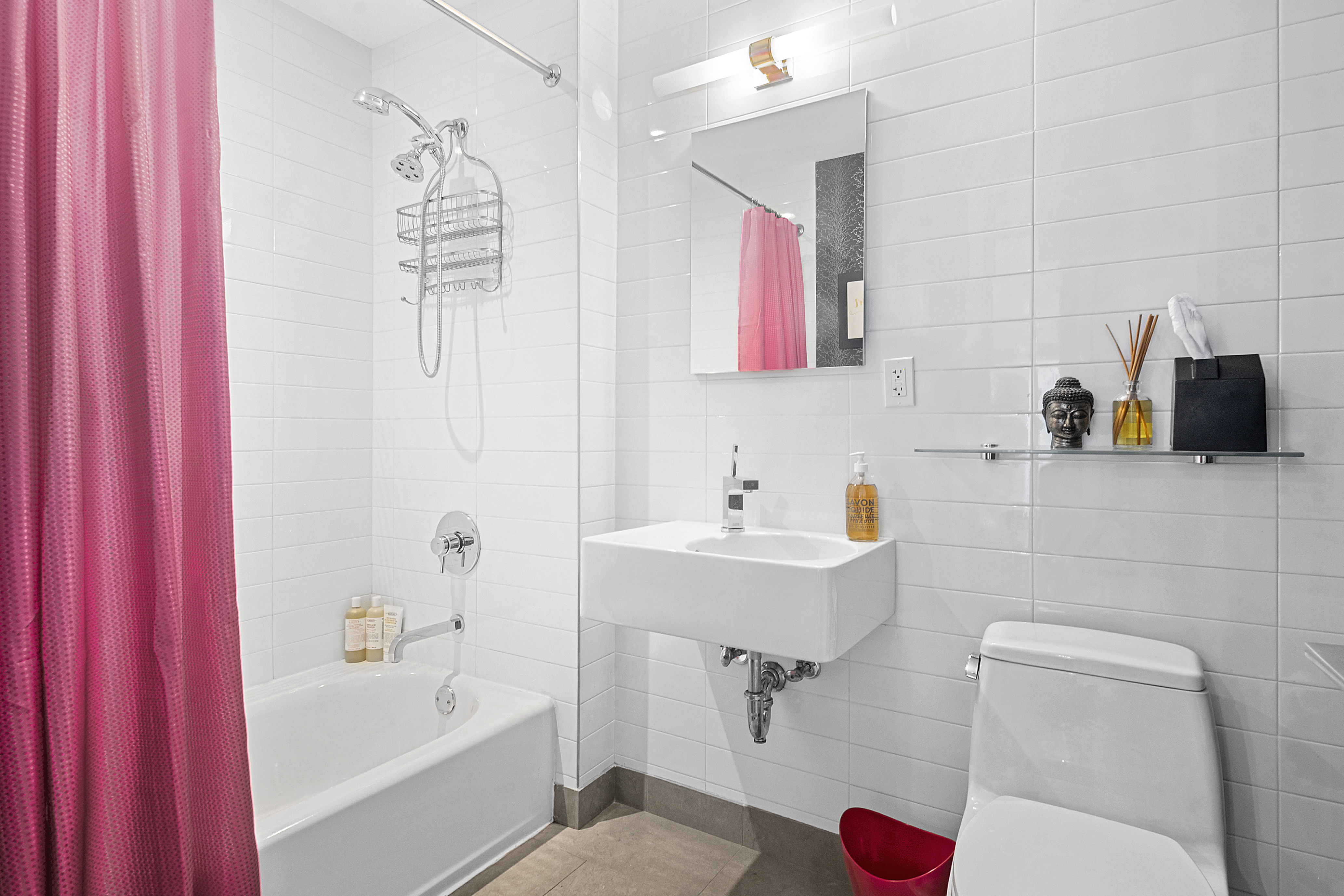 360 Furman Street, Unit 723 Brooklyn, NY 11201 - Photo 4 of 41 a bathroom with a sink a toilet and shower