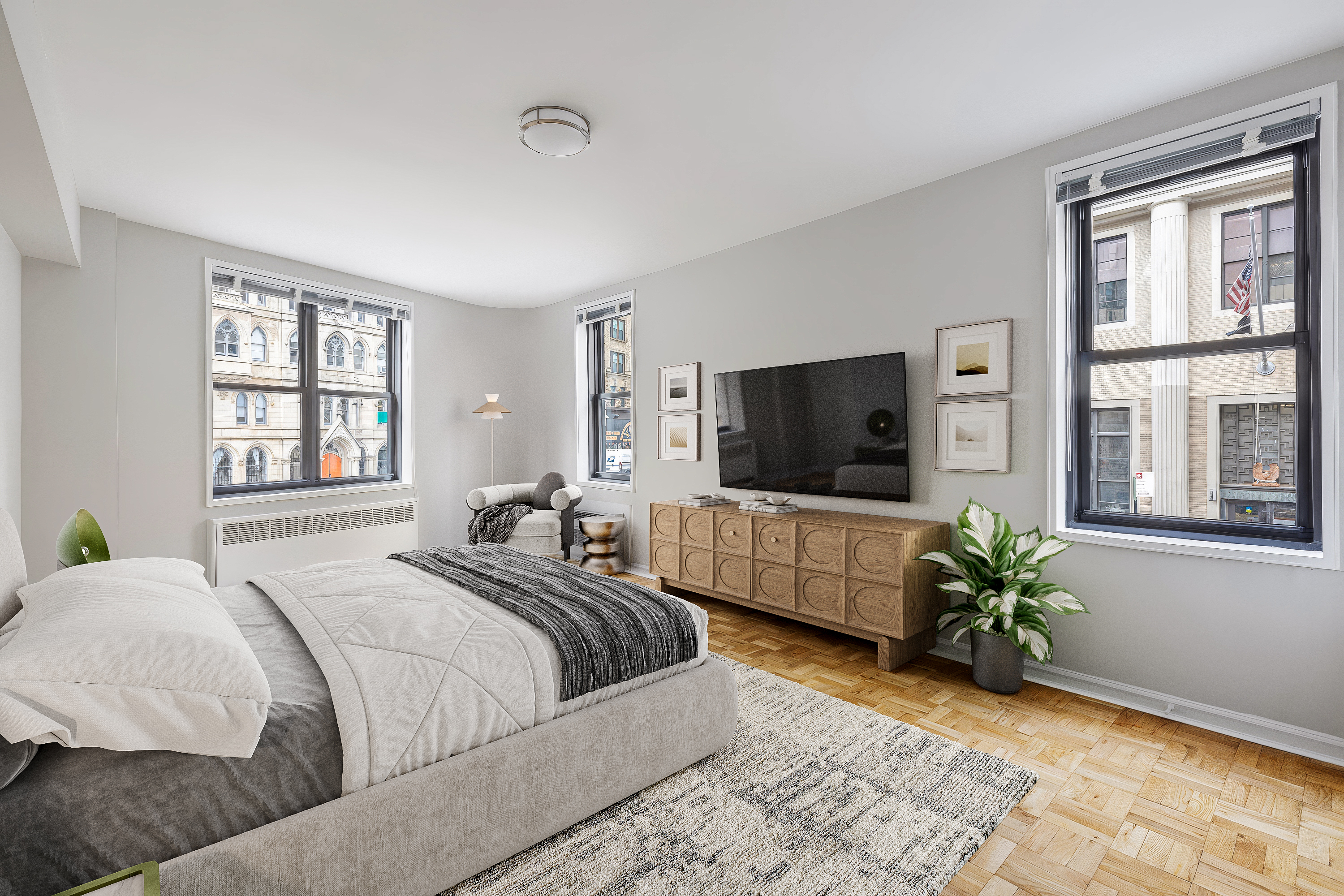 85 4th Avenue, Unit 3FF Manhattan, NY 10003 - Photo 3 of 9 a bedroom with bed tv and window