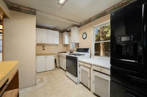 a view of storage and utility room with washer and dryer