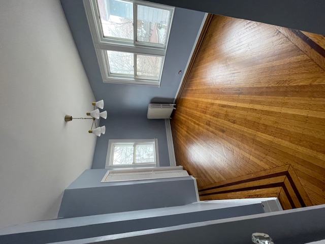 340 Marlborough Road Brooklyn, NY 11226 - Photo 19 of 27 wooden floor in an empty room with a window