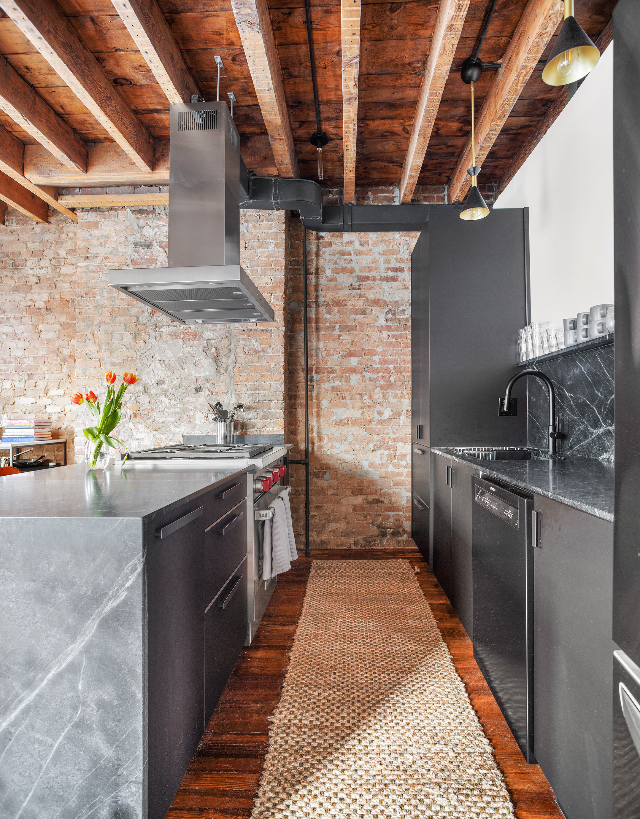 252 Dean Street, Unit 2 Brooklyn, NY 11217 - Photo 2 of 9 a kitchen with stainless steel appliances granite countertop a sink stove and refrigerator