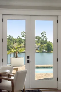 a bedroom with a bed and flat screen tv