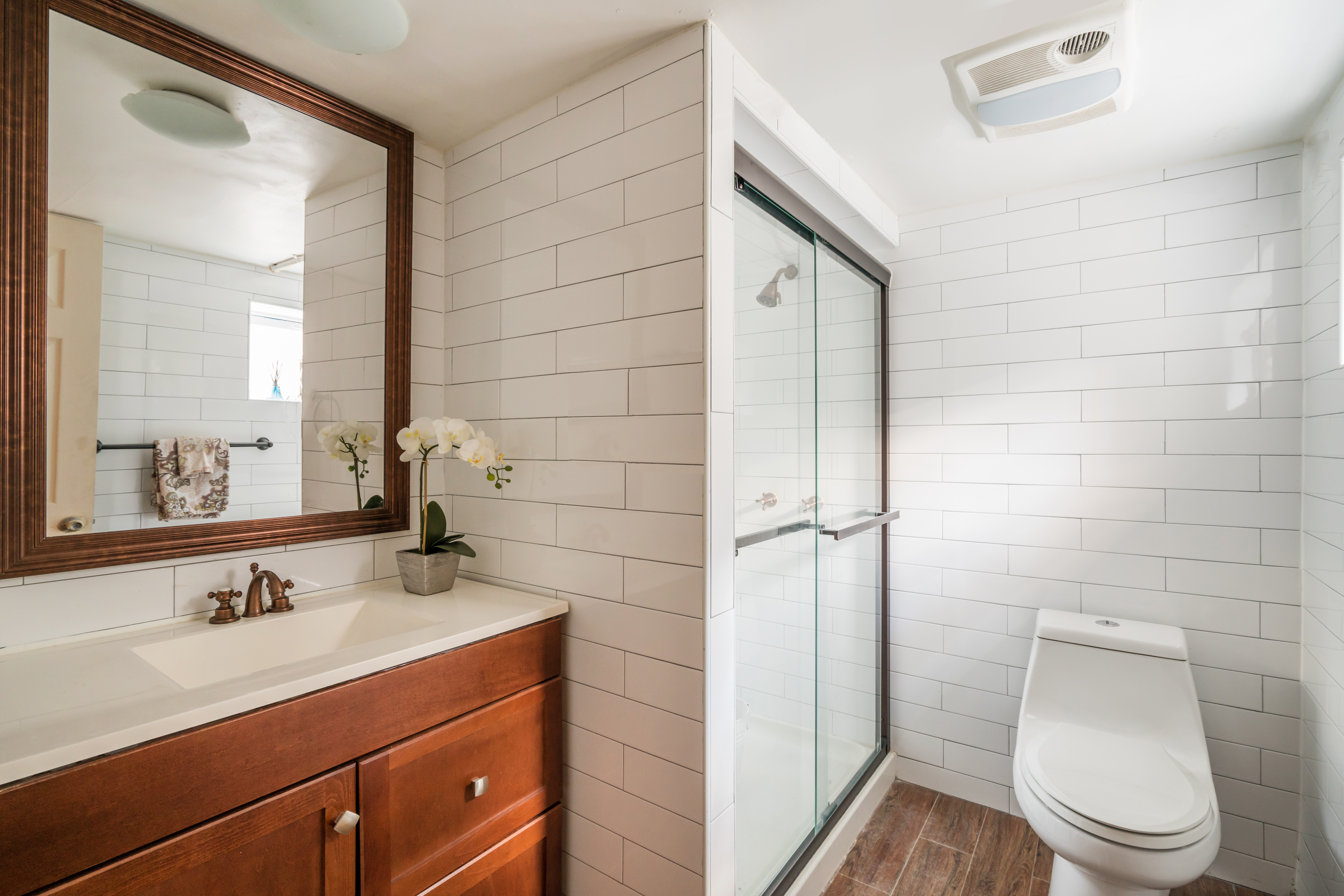 383 Bainbridge Street, Unit 1 Brooklyn, NY 11233 - Photo 7 of 14 a bathroom with a sink toilet and shower