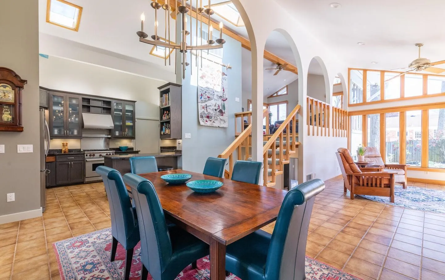 a dining room with furniture and wooden floor