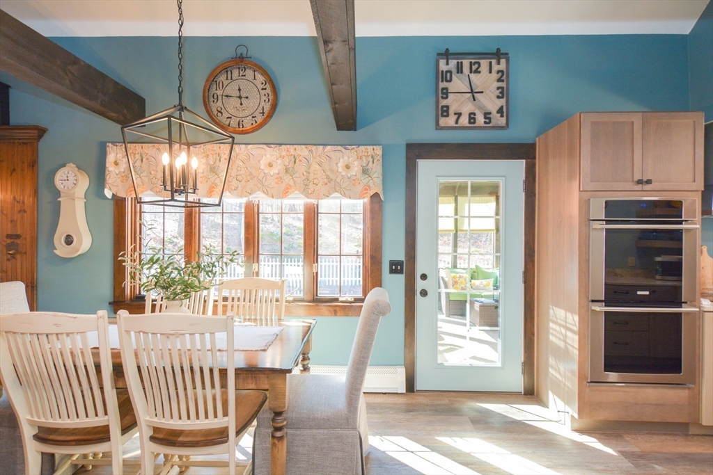 187 Blackstone Street Mendon, MA 01756 - Photo 12 of 42 a view of a dining room with furniture window and outside view