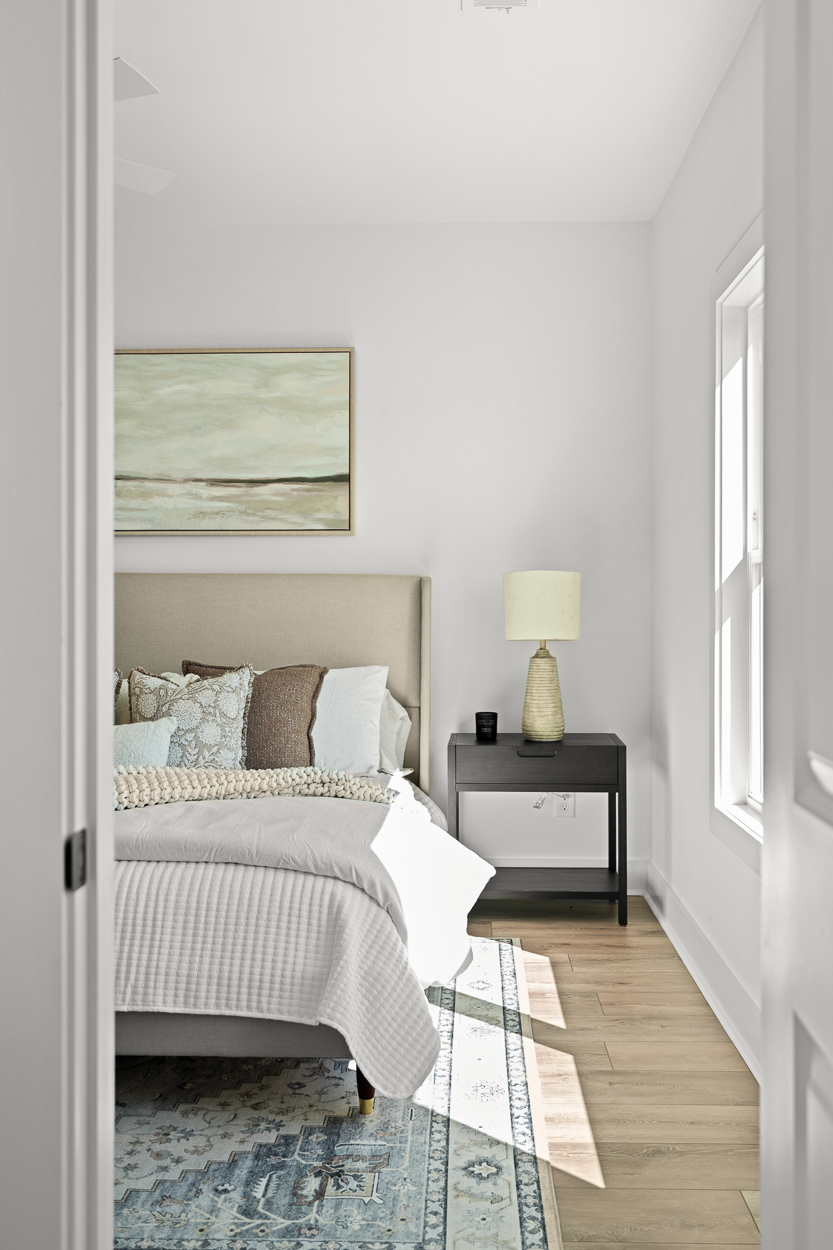 367 Kings Landing Atlanta, GA 30354 - Photo 25 of 45 a bedroom with a bed and wooden floor