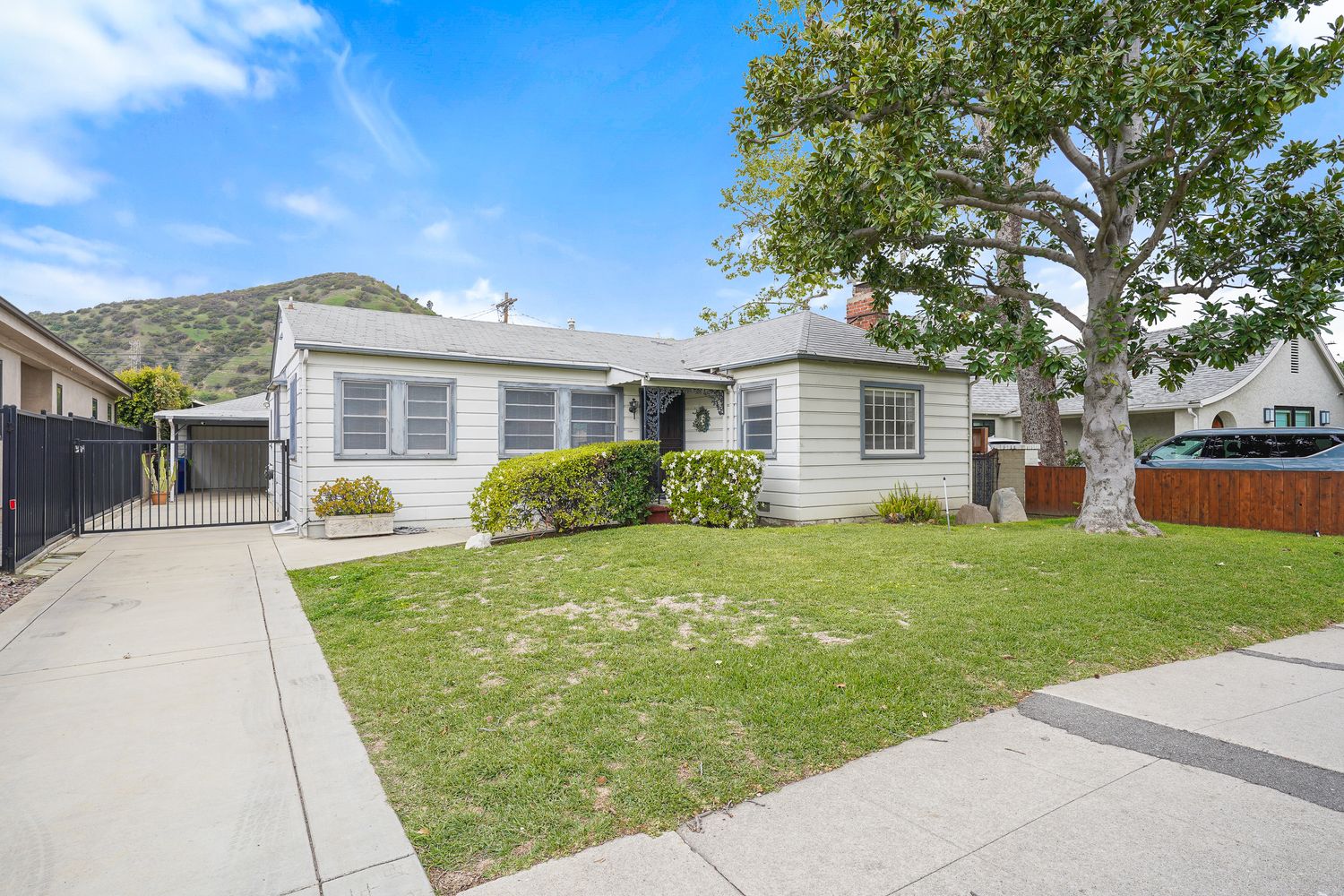 a front view of a house with a yard
