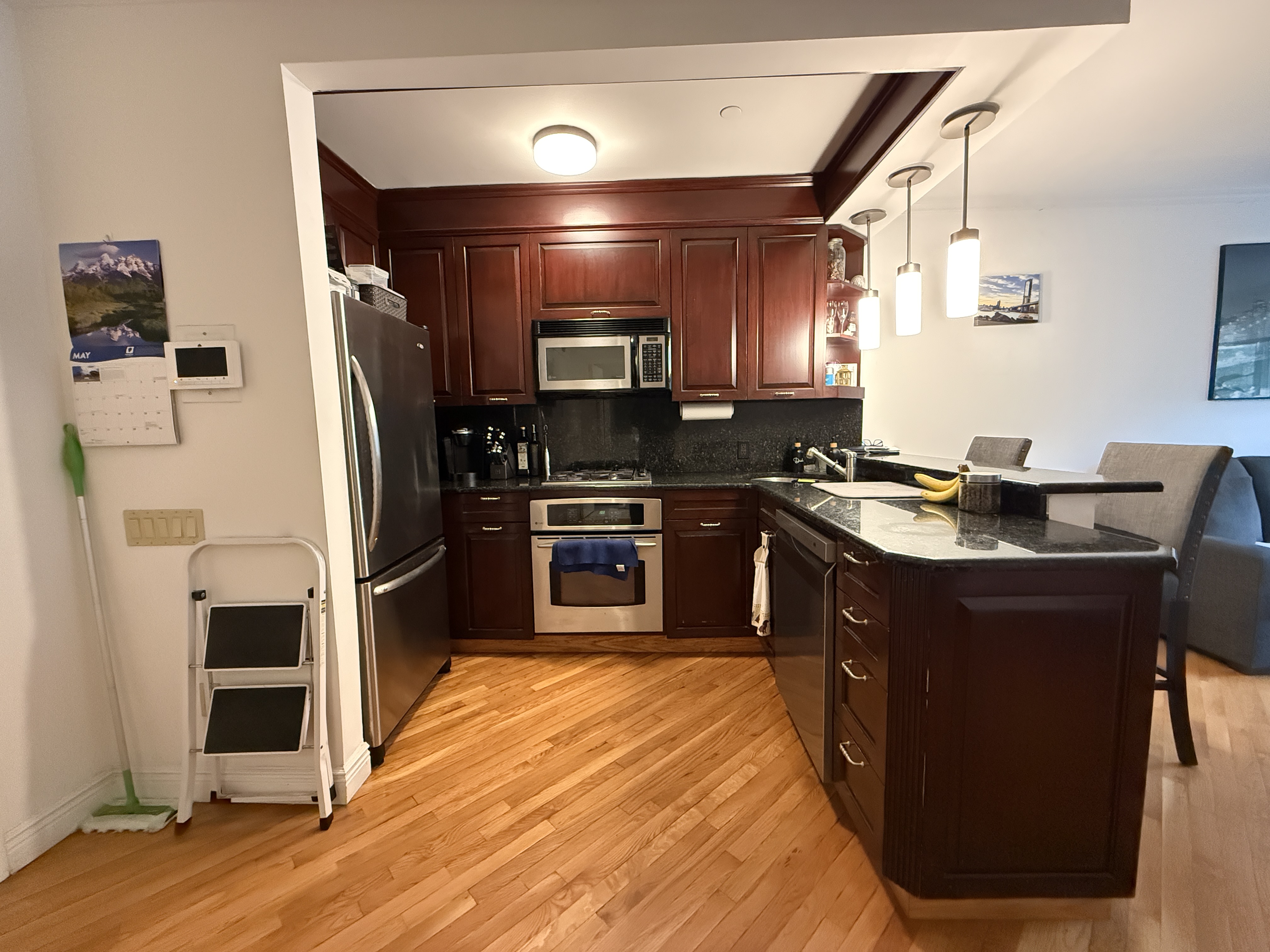 101 Prospect Park Southwest, Unit 3B Brooklyn, NY 11218 - Photo 7 of 23 a kitchen with stainless steel appliances granite countertop a stove a sink and a refrigerator