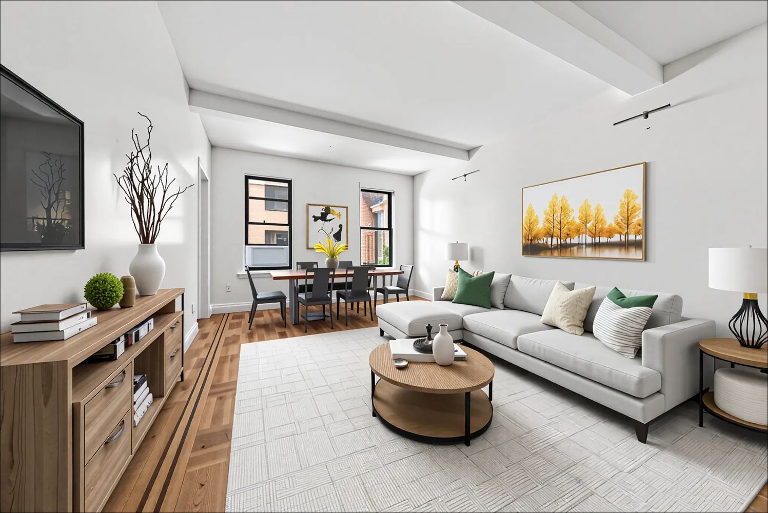 a living room with furniture and a flat screen tv