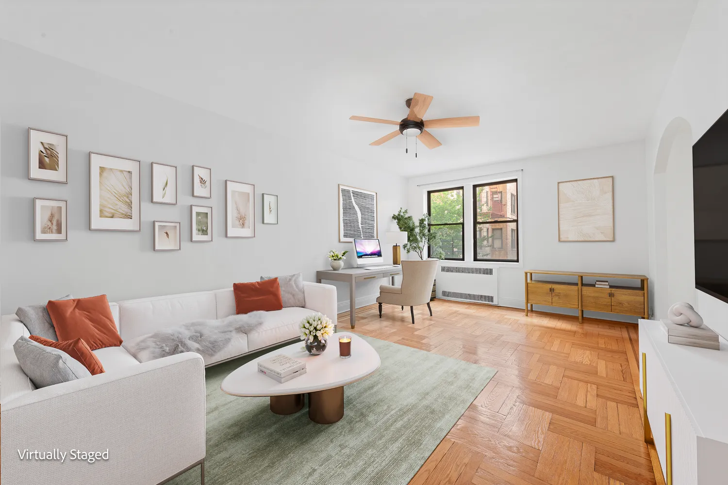 a living room with furniture and wooden floor