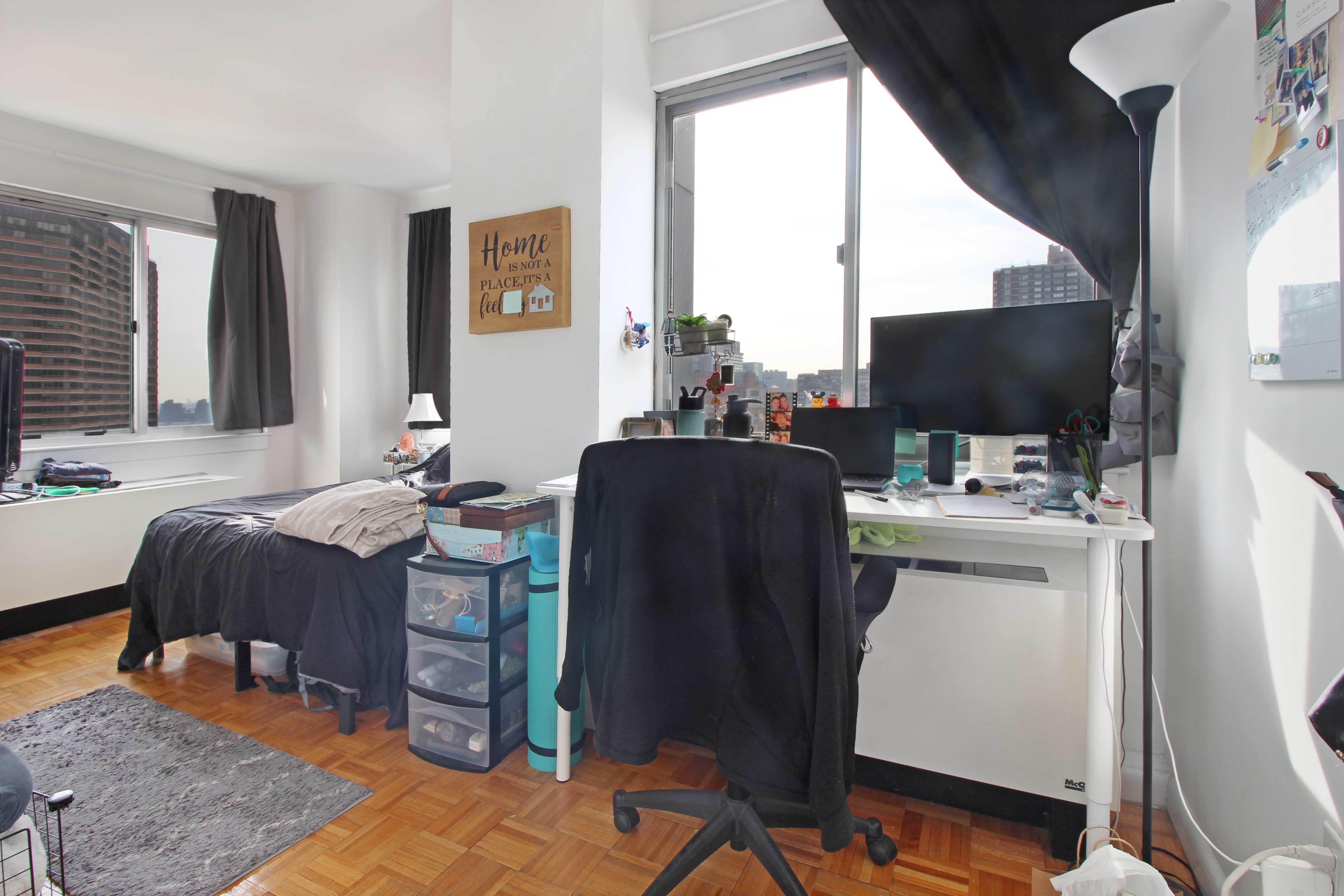 308 East 38th Street, Unit 20A Manhattan, NY 10016 - Photo 12 of 13 a living room with furniture and a flat screen tv