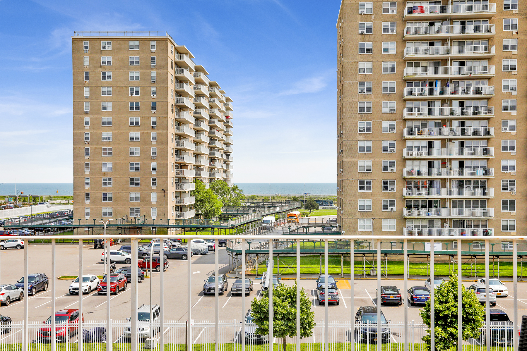 102-20 Rockaway Beach Boulevard, Unit 3C Queens, NY 11694 - Photo 32 of 36 a view of a city with tall buildings