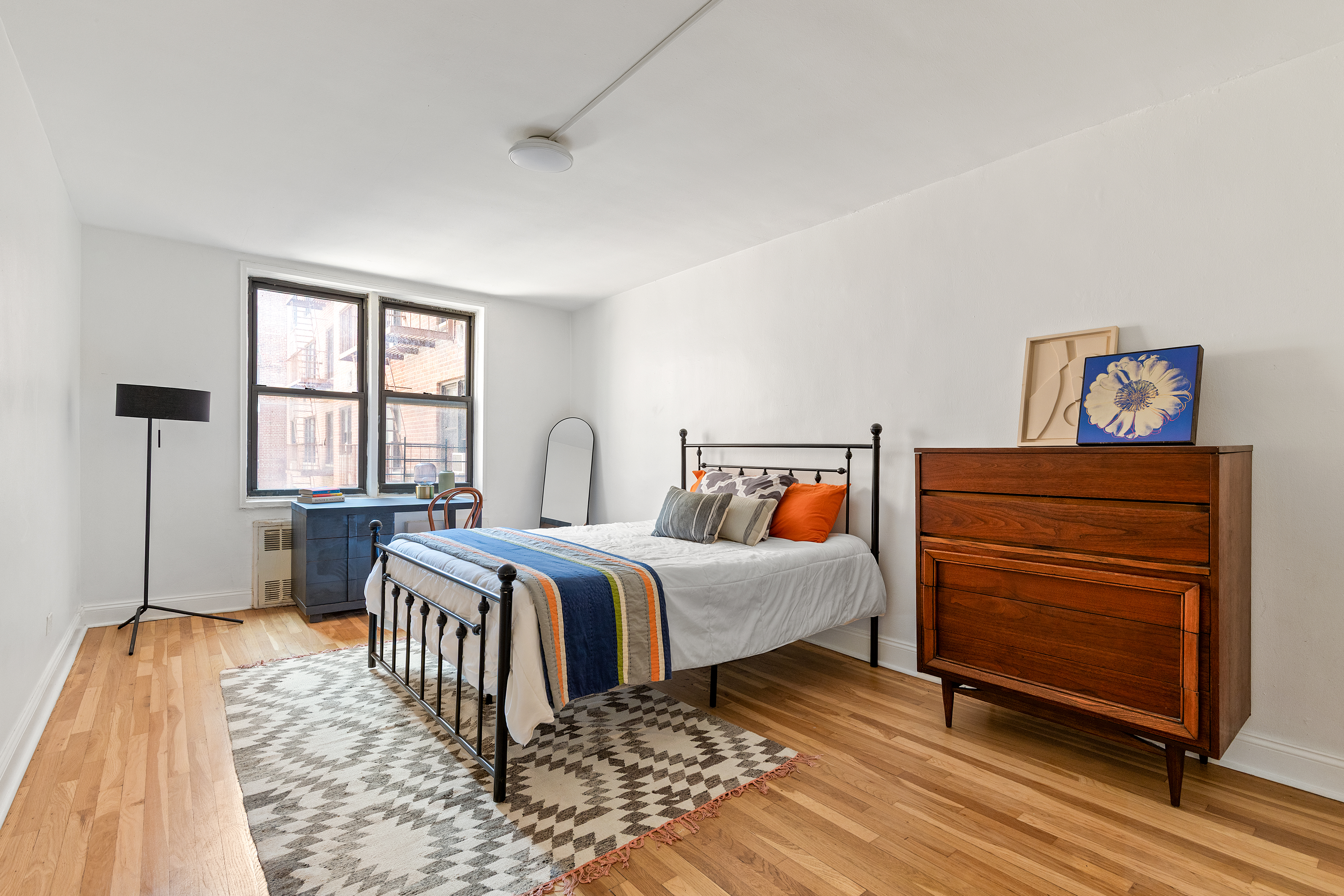 310 Lenox Road, Unit 4J Brooklyn, NY 11226 - Photo 3 of 6 a bed room with a bed and a window