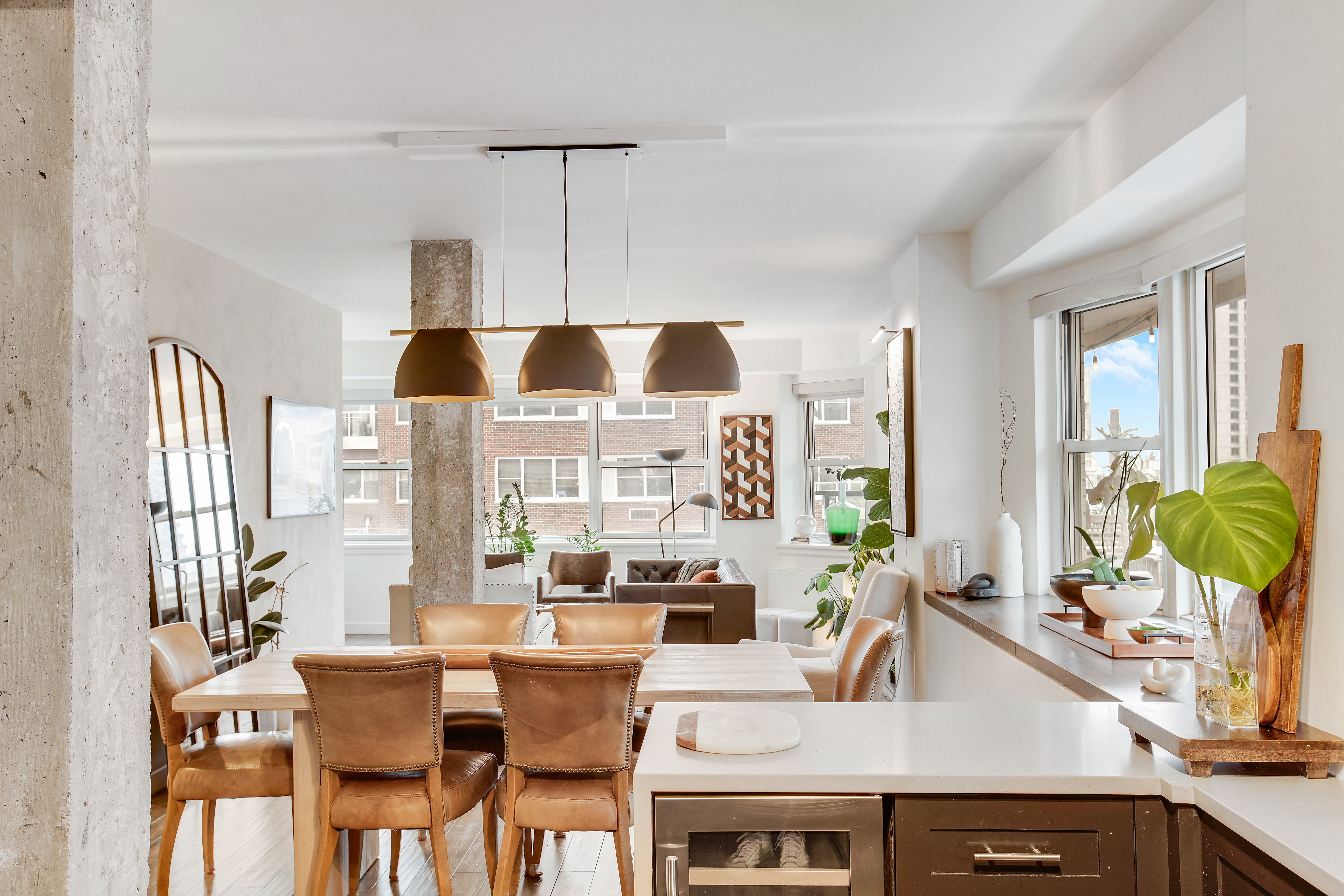 175 East 62nd Street, Unit 18B Manhattan, NY 10065 - Photo 4 of 17 a view of a dining room with furniture and window