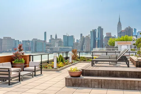 a view of a terrace with chairs