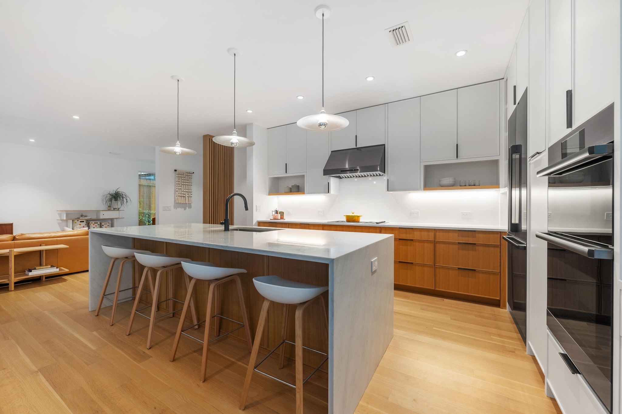 1206 Bickler Road Austin, TX 78704 - Photo 28 of 65 a kitchen with stainless steel appliances granite countertop a sink a stove a refrigerator and island