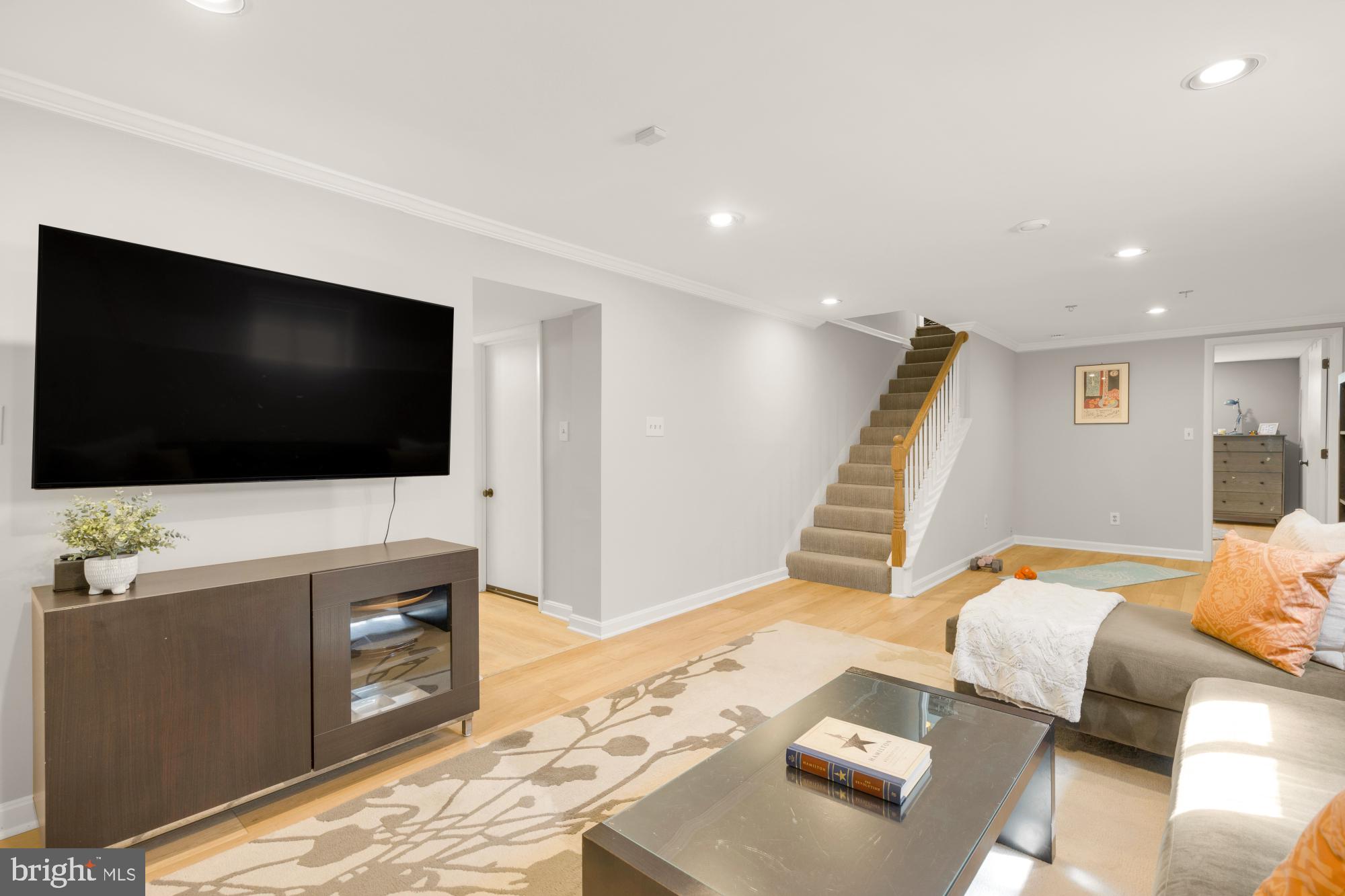 2611 Ross Road Chevy Chase, MD 20815 - Photo 24 of 37 a living room with furniture and a flat screen tv