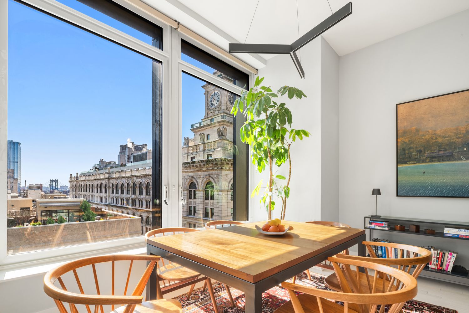 a dining room with a table and chairs