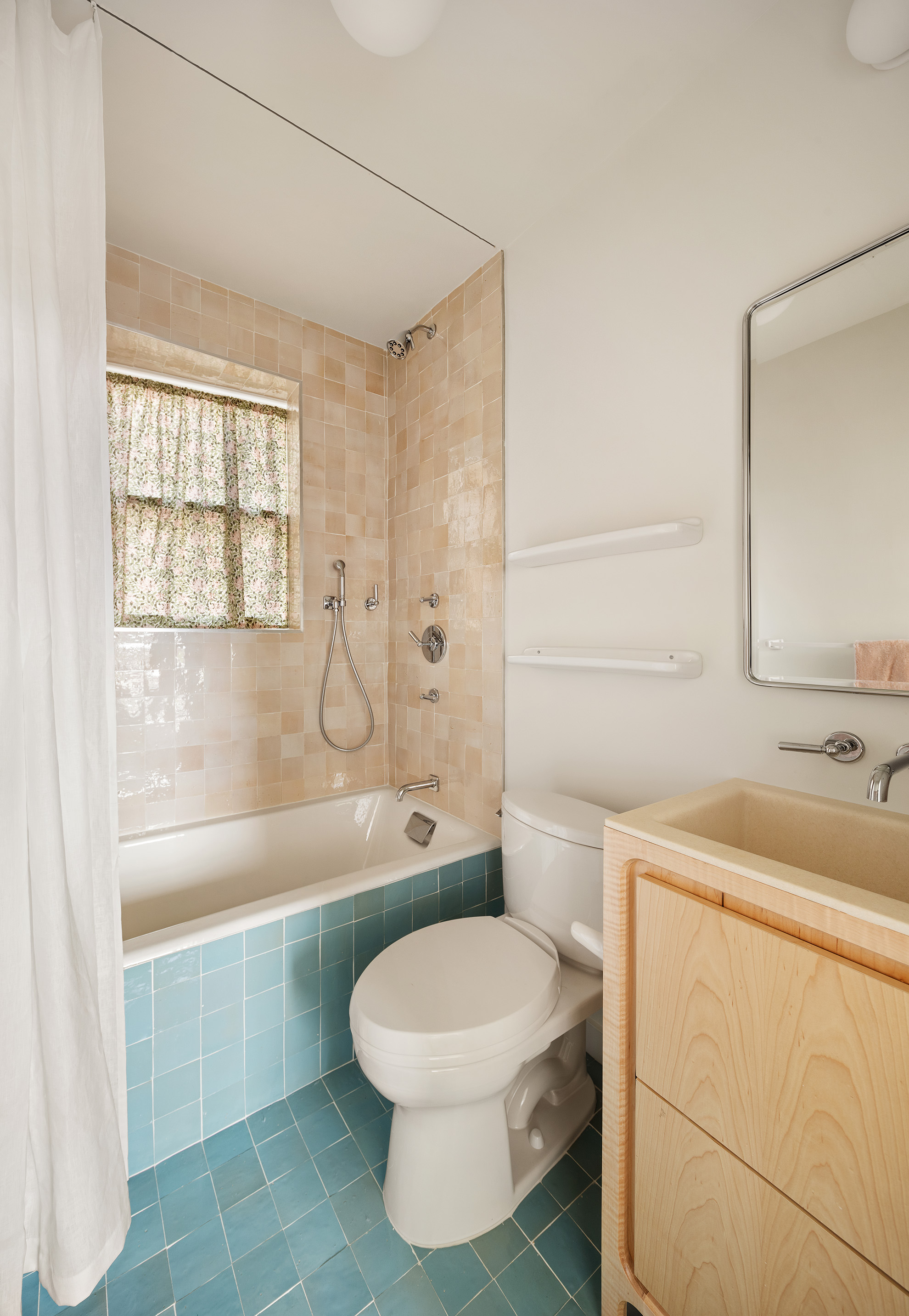 99 Avenue B, Unit PHDE Manhattan, NY 10009 - Photo 12 of 18 a bathroom with a sink a toilet and a bathtub