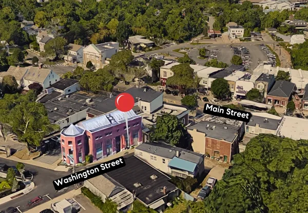an aerial view of a highlighted house
