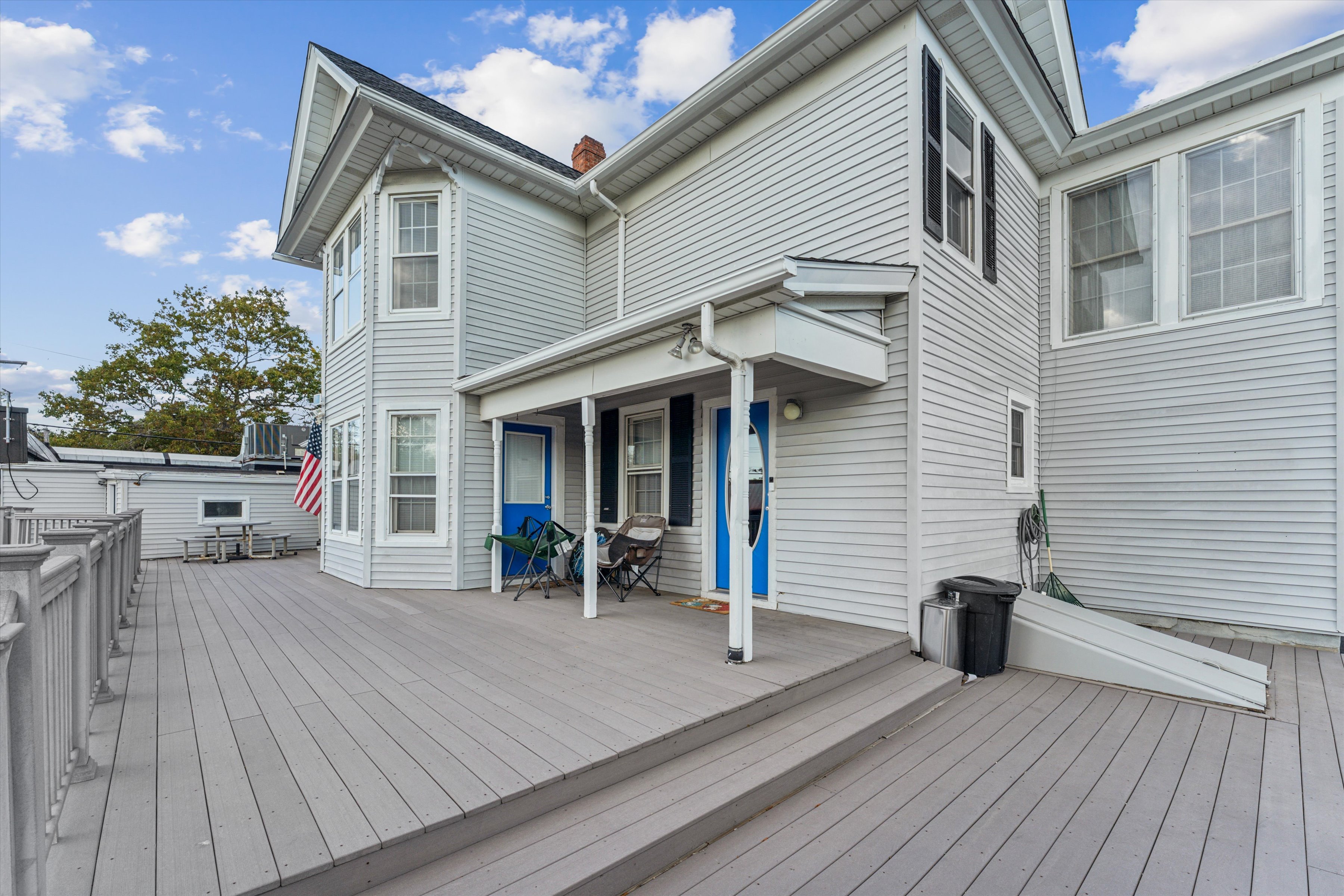 13500 Main Road Mattituck, NY 11952 - Photo 8 of 10 a view of a house with a patio and wooden flooring
