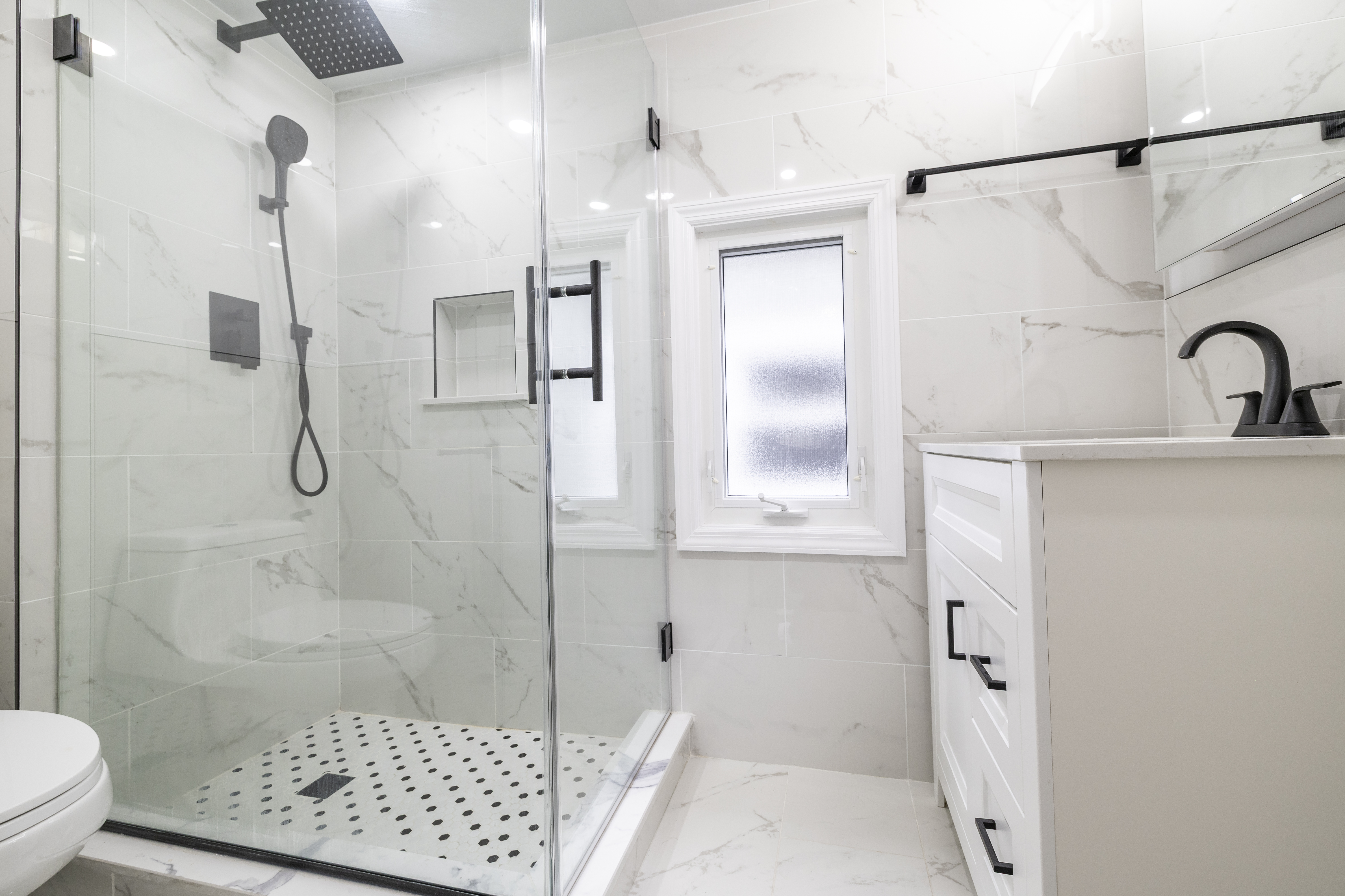 87-46 89th Street Queens, NY 11421 - Photo 13 of 25 a bathroom with a shower and a toilet