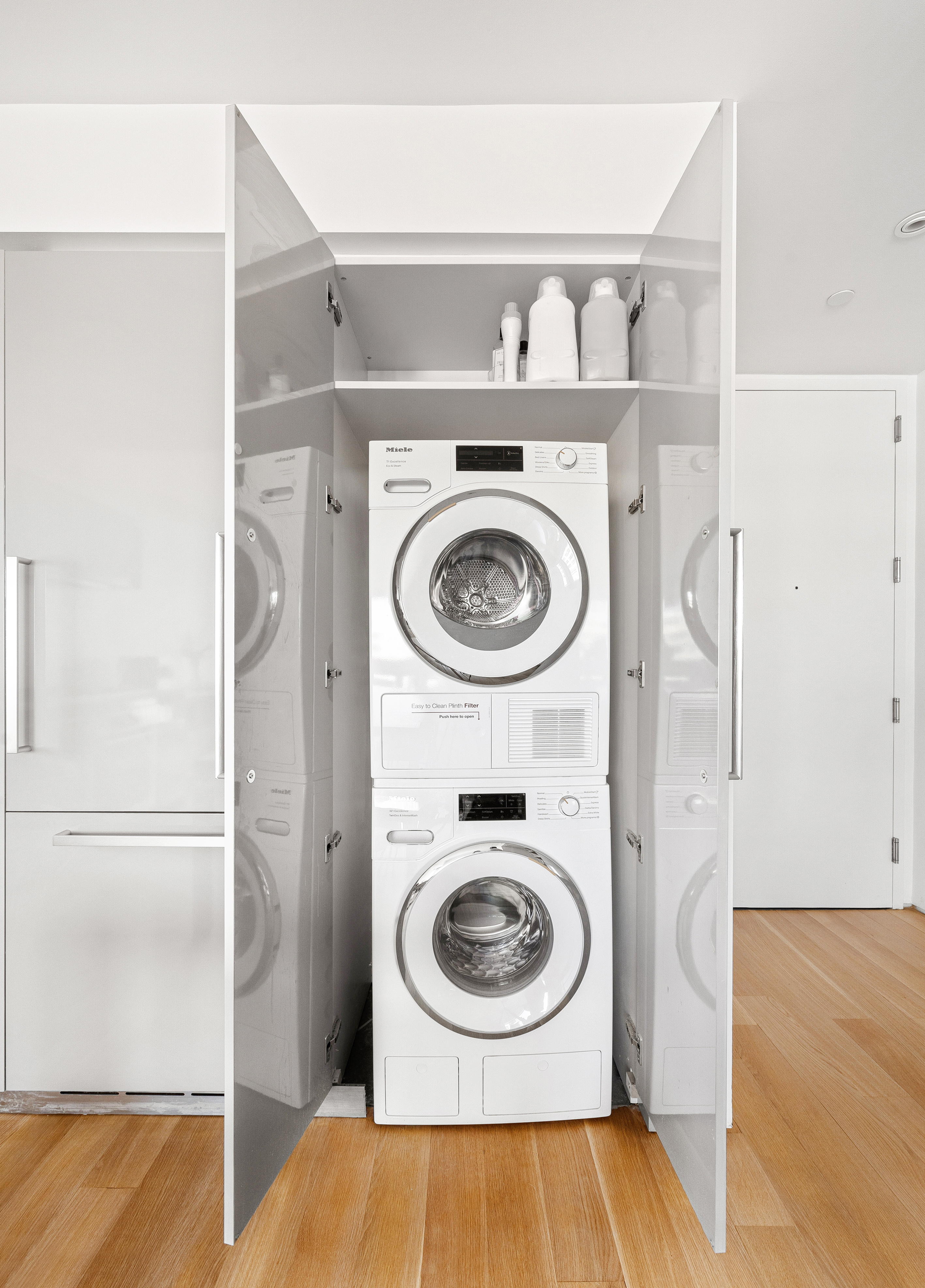 123 3rd Avenue, Unit 9C Manhattan, NY 10003 - Photo 5 of 16 a utility room with dryer and washer