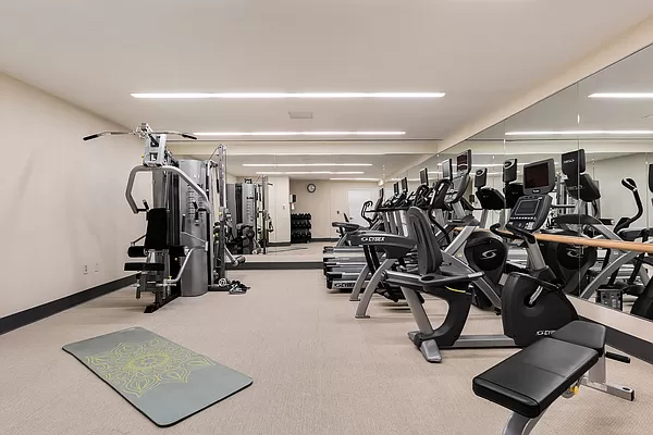 40 East 66th Street, Unit 8C Manhattan, NY 10065 - Photo 14 of 16 a view of a room with gym equipment