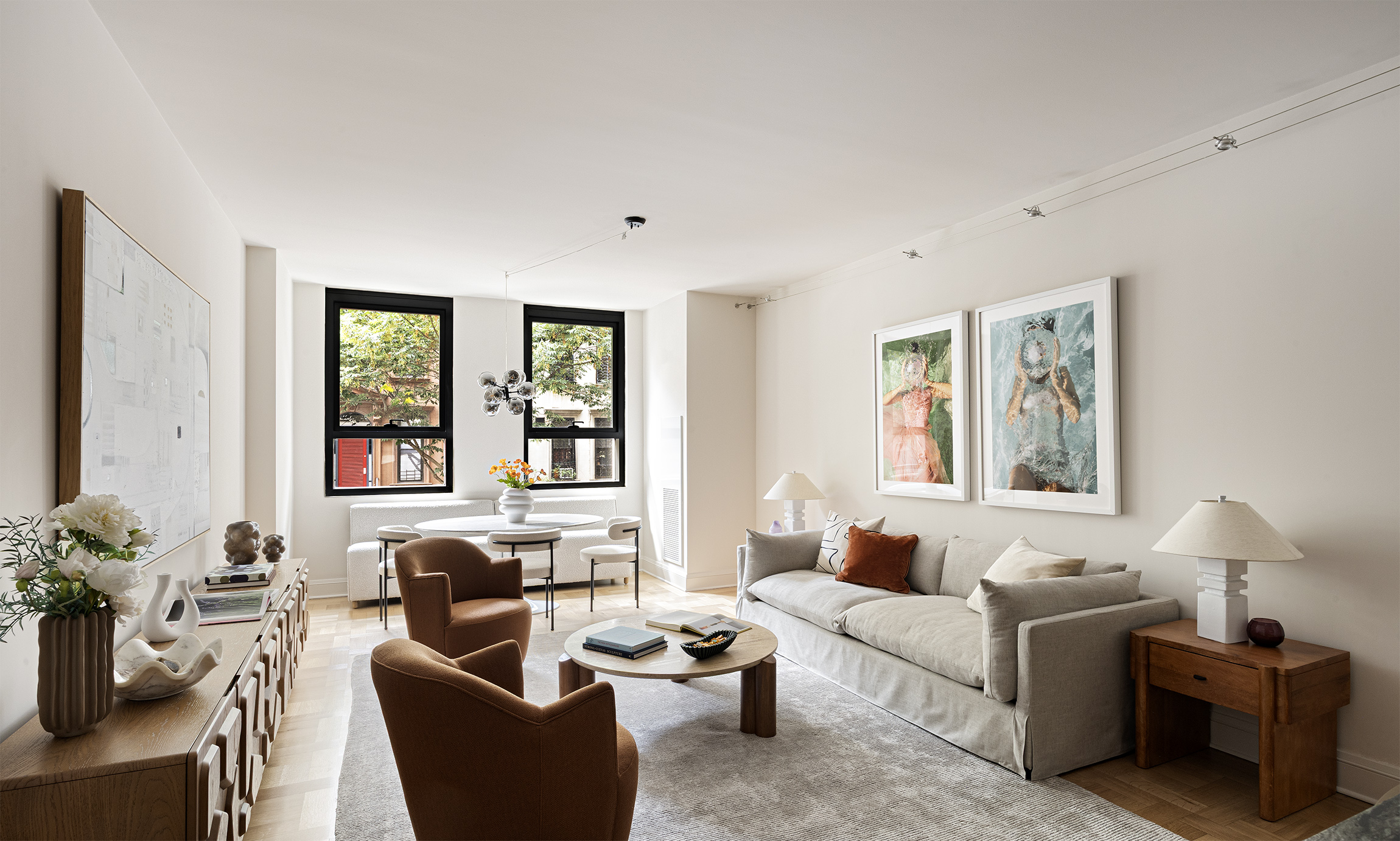 170 East End Avenue, Unit 2AB Manhattan, NY 10128 - Photo 5 of 16 a living room with furniture and large windows