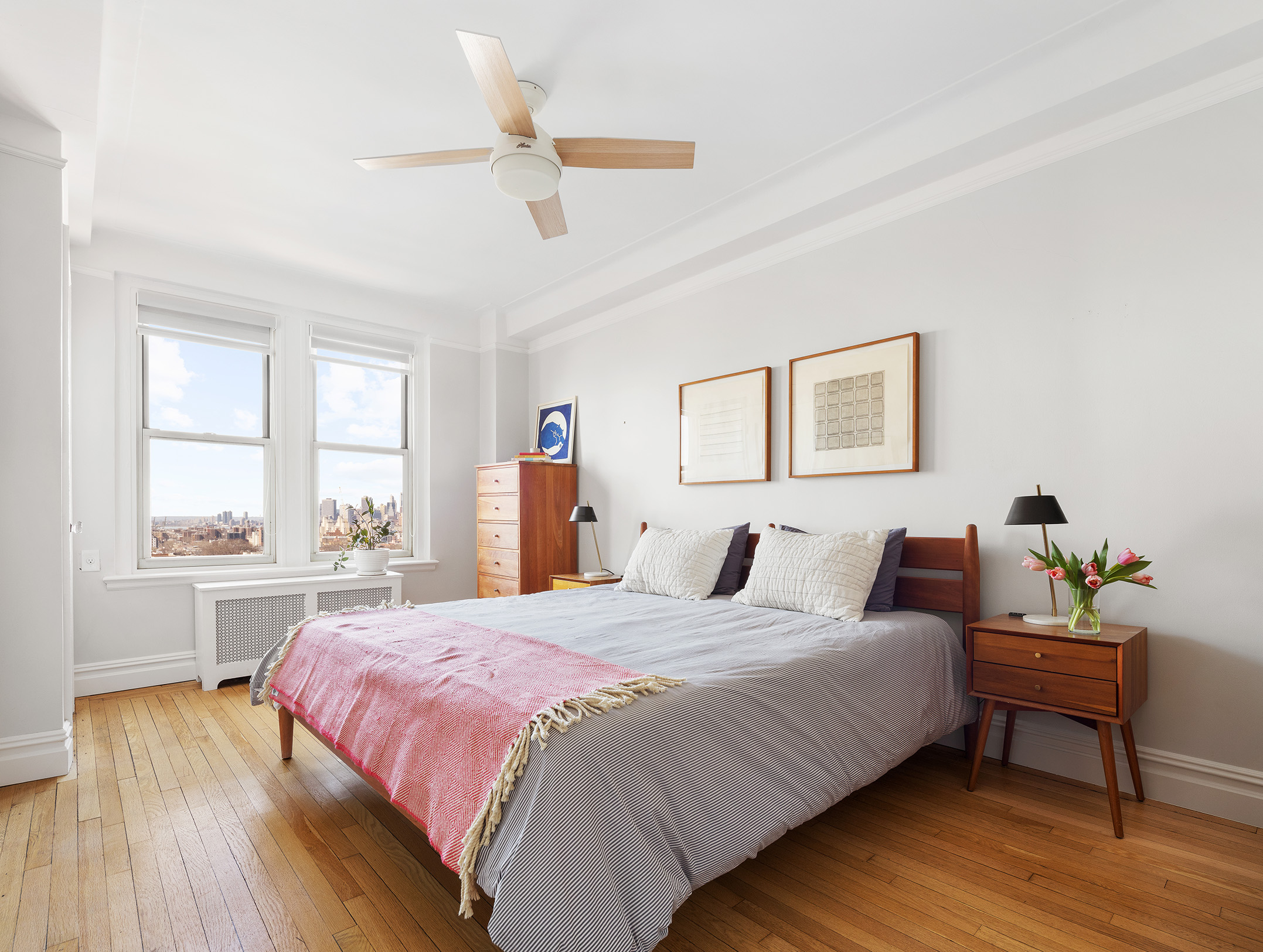 39 Plaza Street West, Unit 7C Brooklyn, NY 11217 - Photo 6 of 12 a bedroom with a bed and a large window