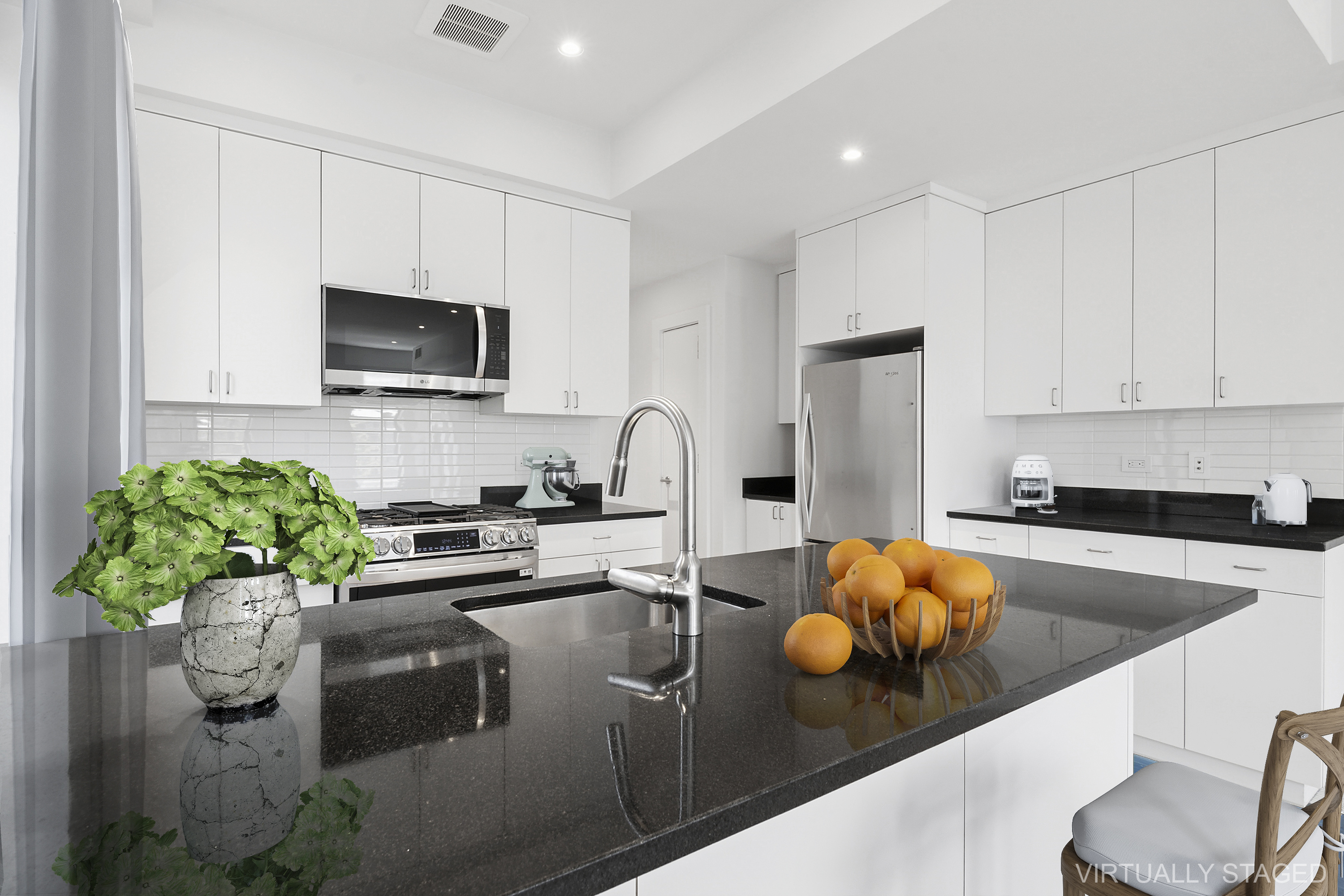 162 Beard Street, Unit 2 Brooklyn, NY 11231 - Photo 5 of 11 a kitchen with stainless steel appliances granite countertop a sink a stove a microwave a refrigerator a stove and white cabinets