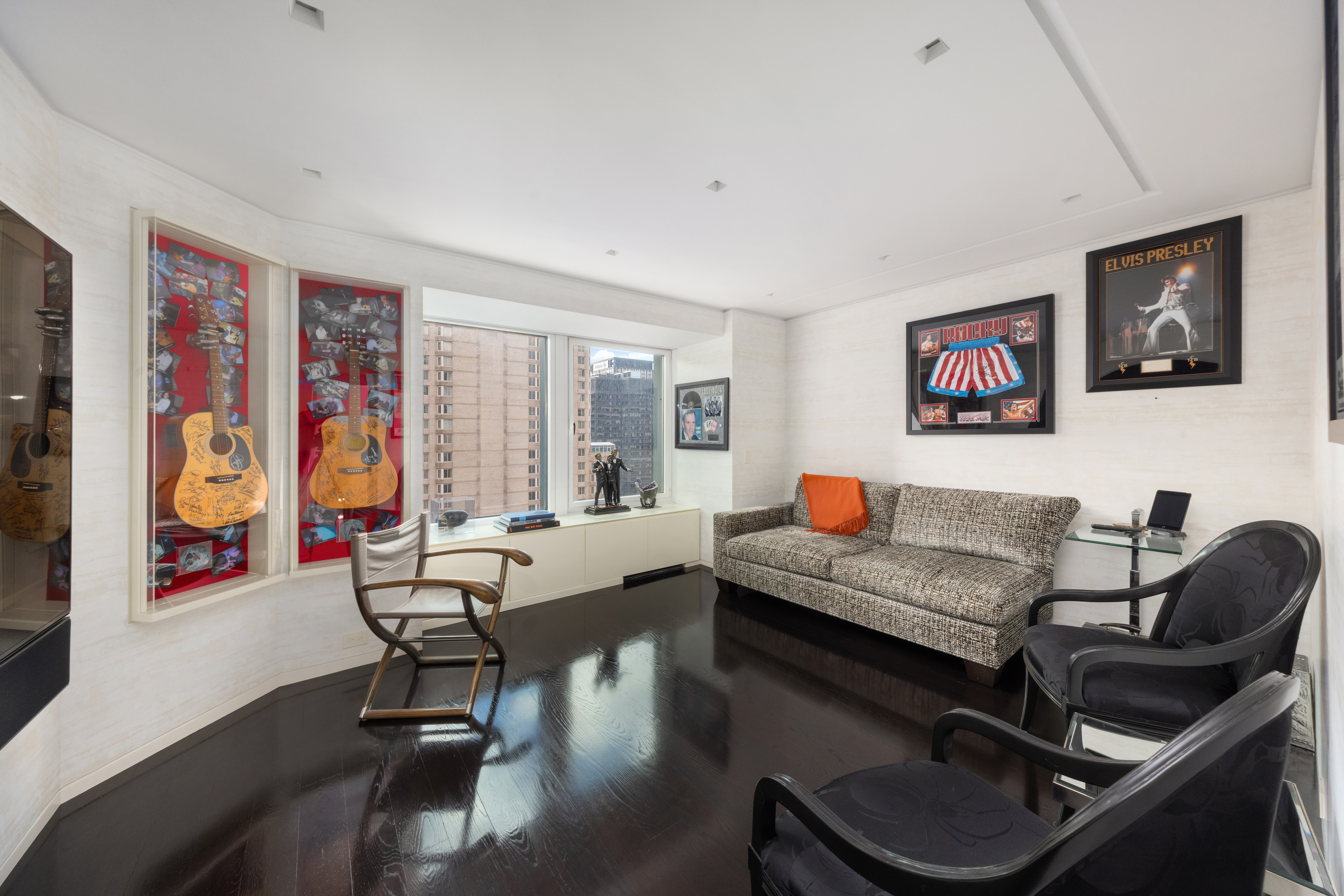 150 West 56th Street, Unit 3901 Manhattan, NY 10019 - Photo 15 of 25 a living room with furniture and a large window