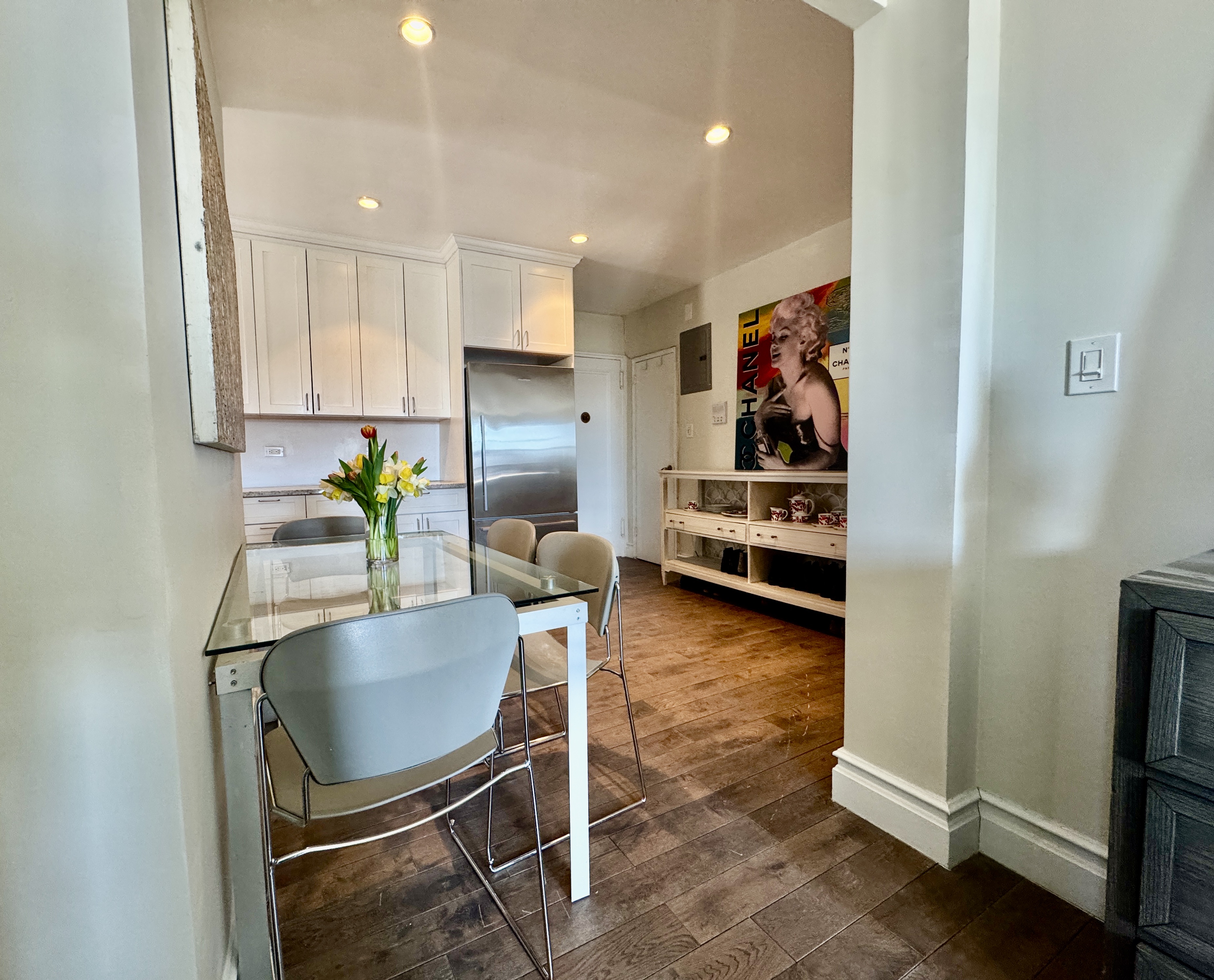 90 Park Terrace East, Unit 3B Manhattan, NY 10034 - Photo 4 of 13 a view of kitchen with dining table and chairs