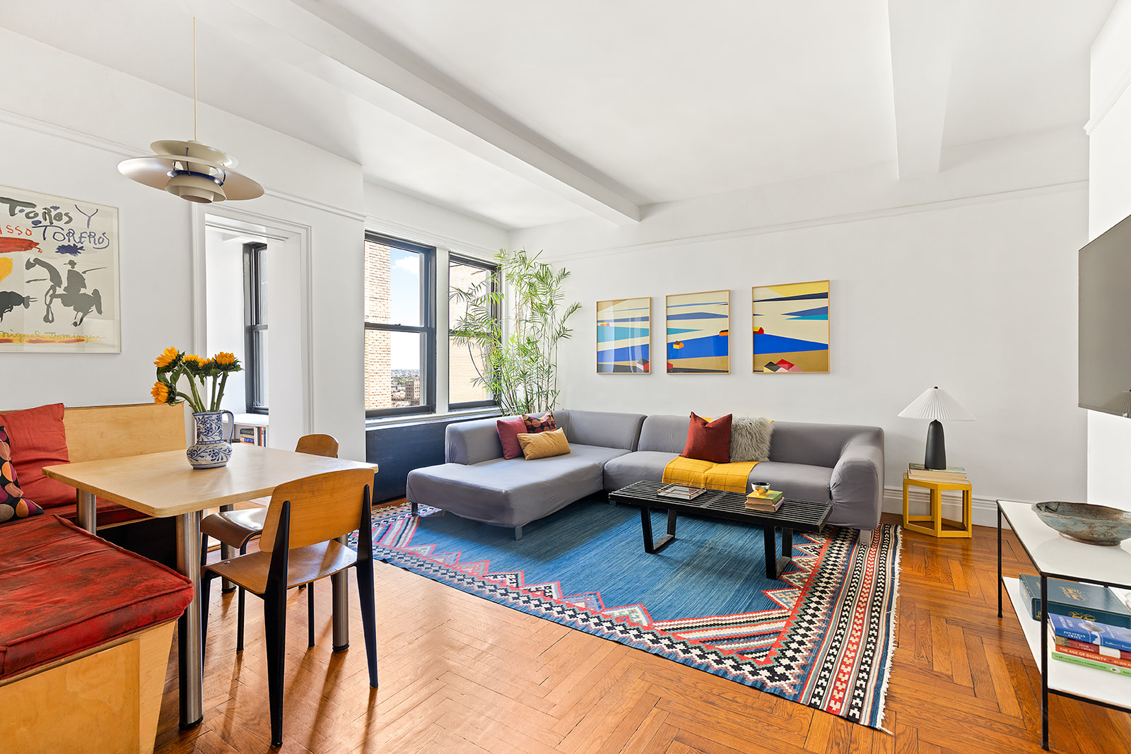 135 Eastern Parkway, Unit 14E Brooklyn, NY 11238 - Photo 5 of 16 a living room with furniture and a window