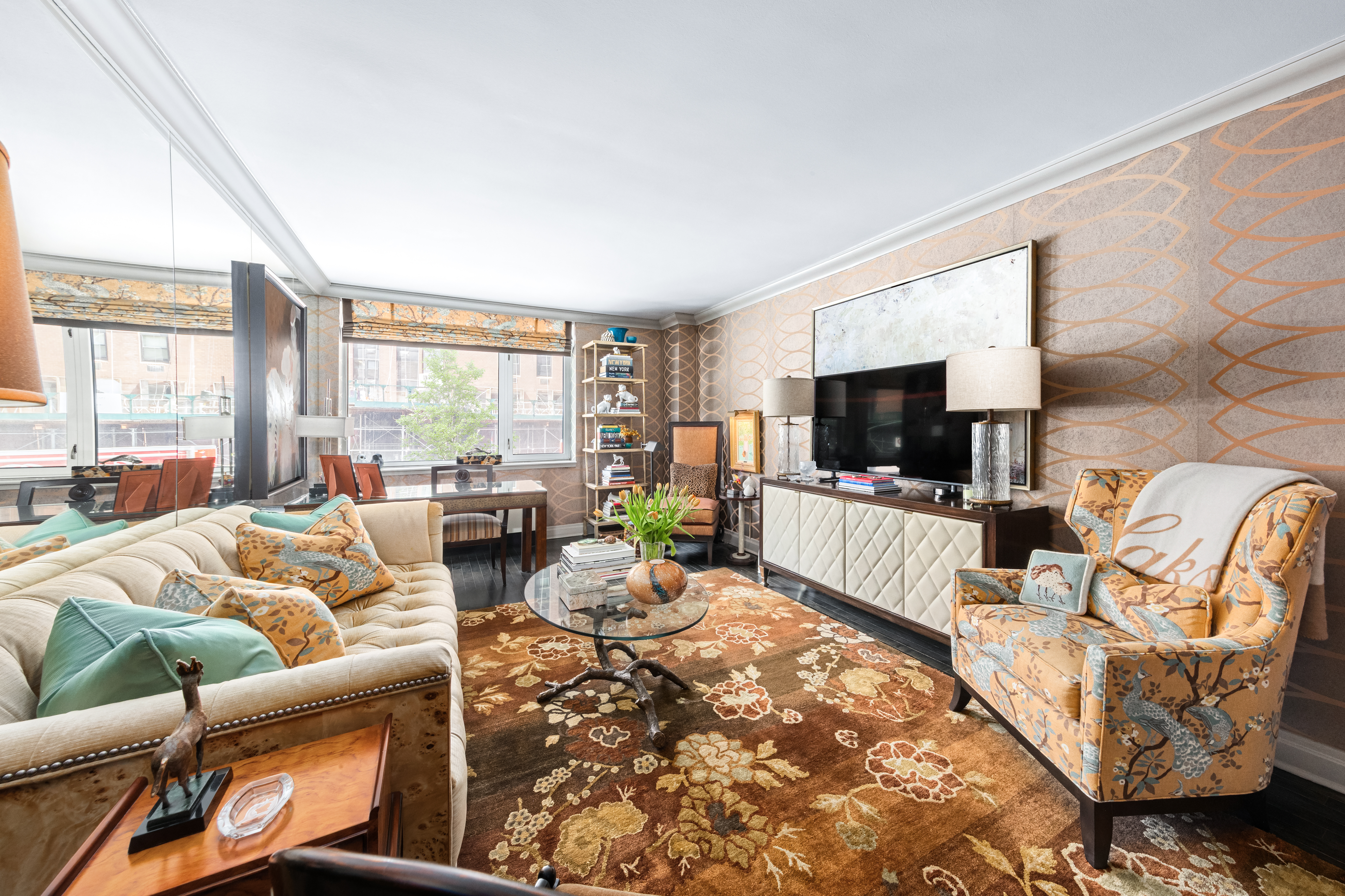 1760 2nd Avenue, Unit 2B Manhattan, NY 10128 - Photo 2 of 13 a living room with furniture flat screen tv and a large window