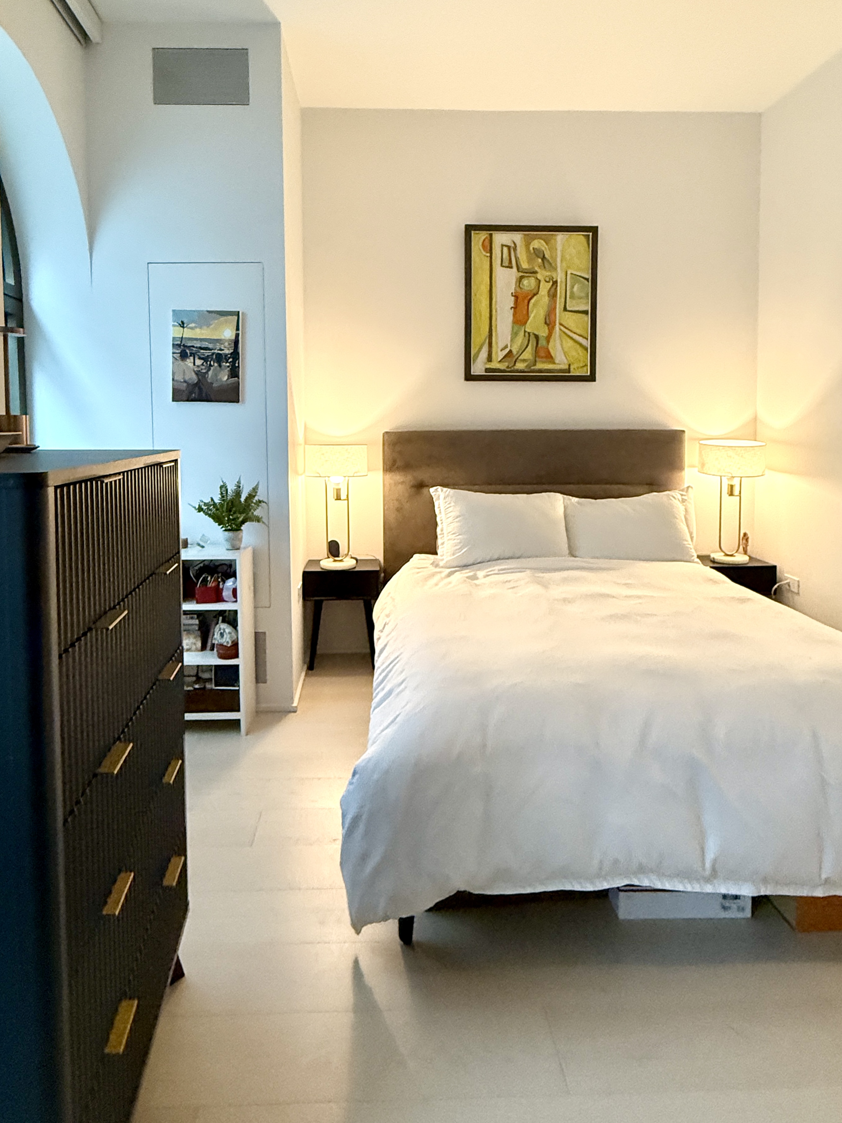 130 William Street, Unit 9E Manhattan, NY 10038 - Photo 11 of 16 a bedroom with a bed and dresser