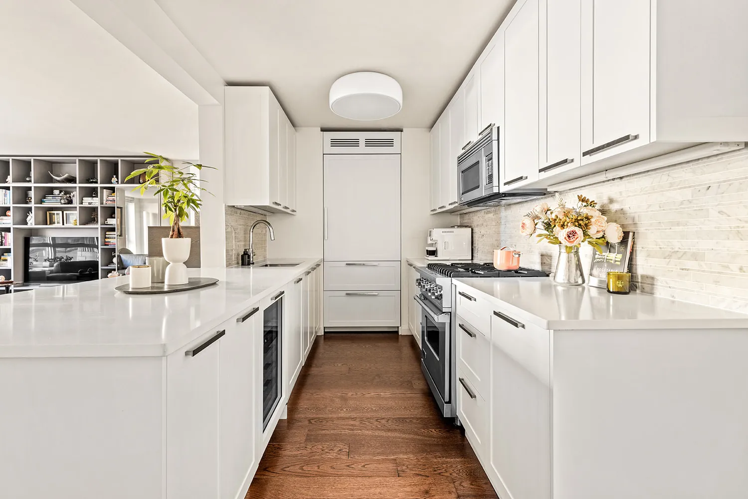 a kitchen with stainless steel appliances granite countertop lots of counter top space and a sink