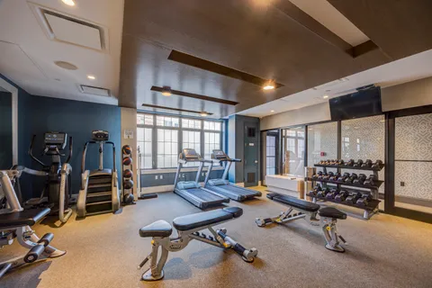 a view of a room with gym equipment