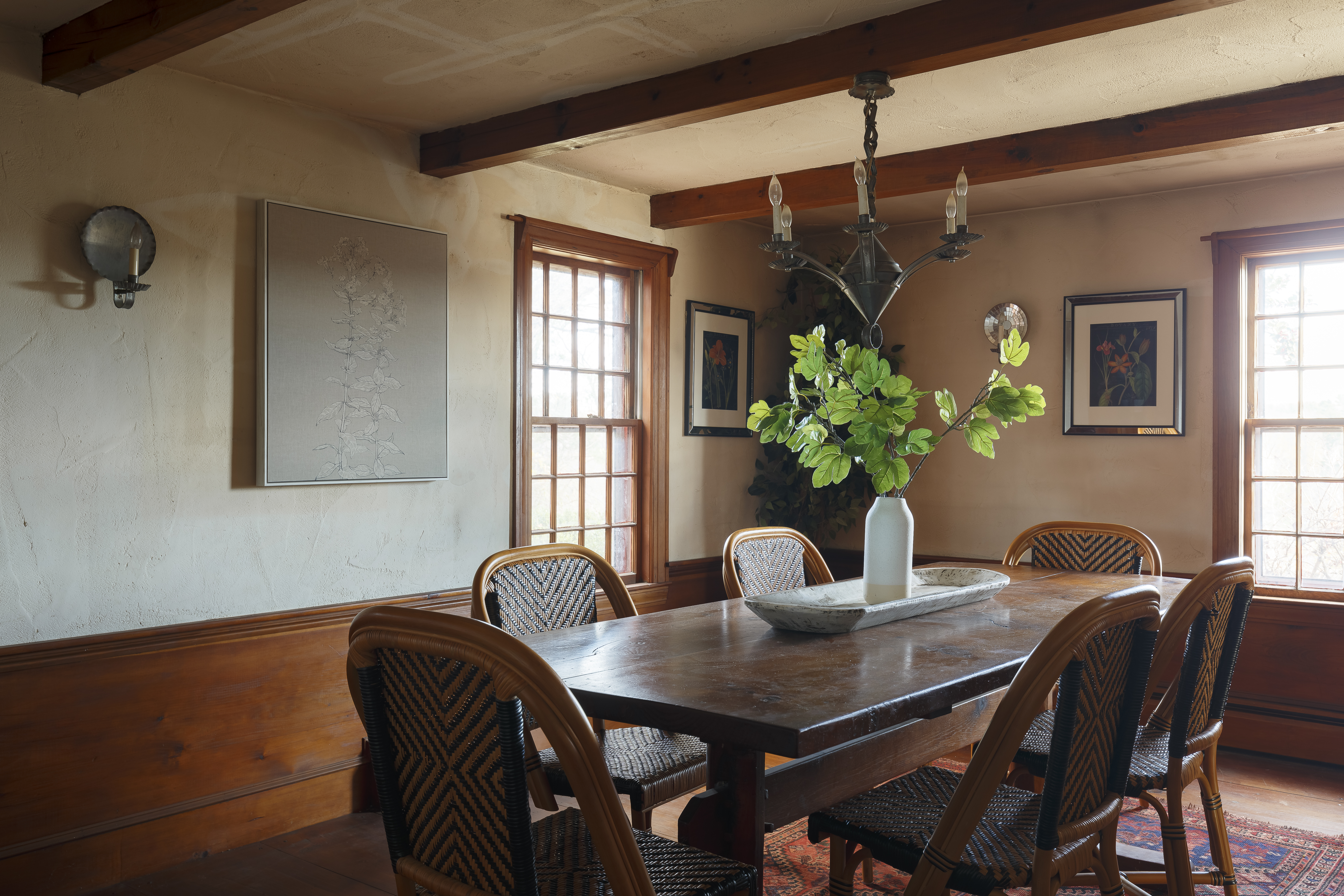 59 Conant Road Lincoln, MA 01773 - Photo 6 of 47 a view of a dining room with furniture and a potted plant