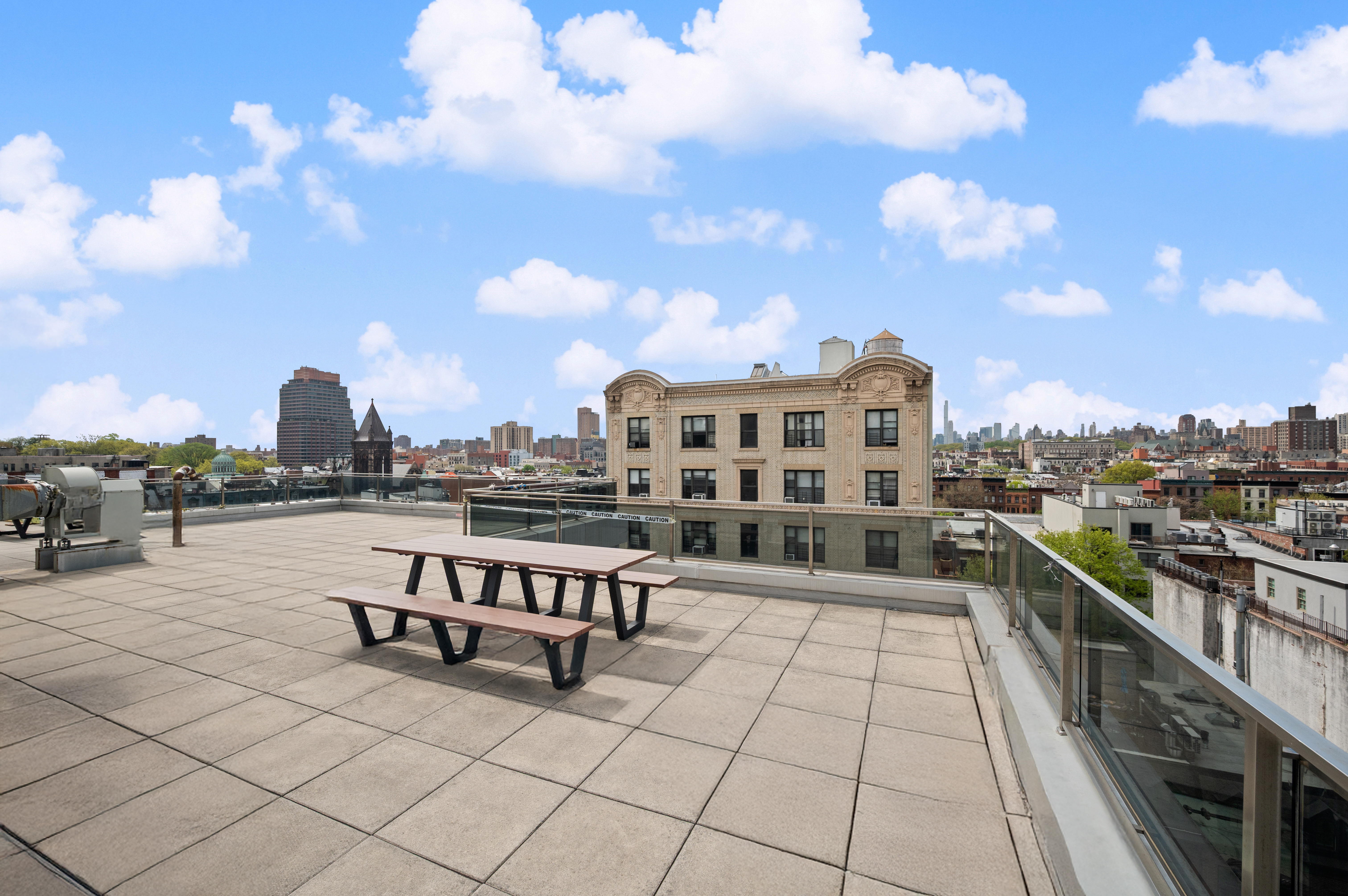 117 West 123rd Street, Unit 5D Manhattan, NY 10027 - Photo 16 of 18 a view of a terrace with sitting area