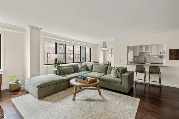 a living room with furniture and a table