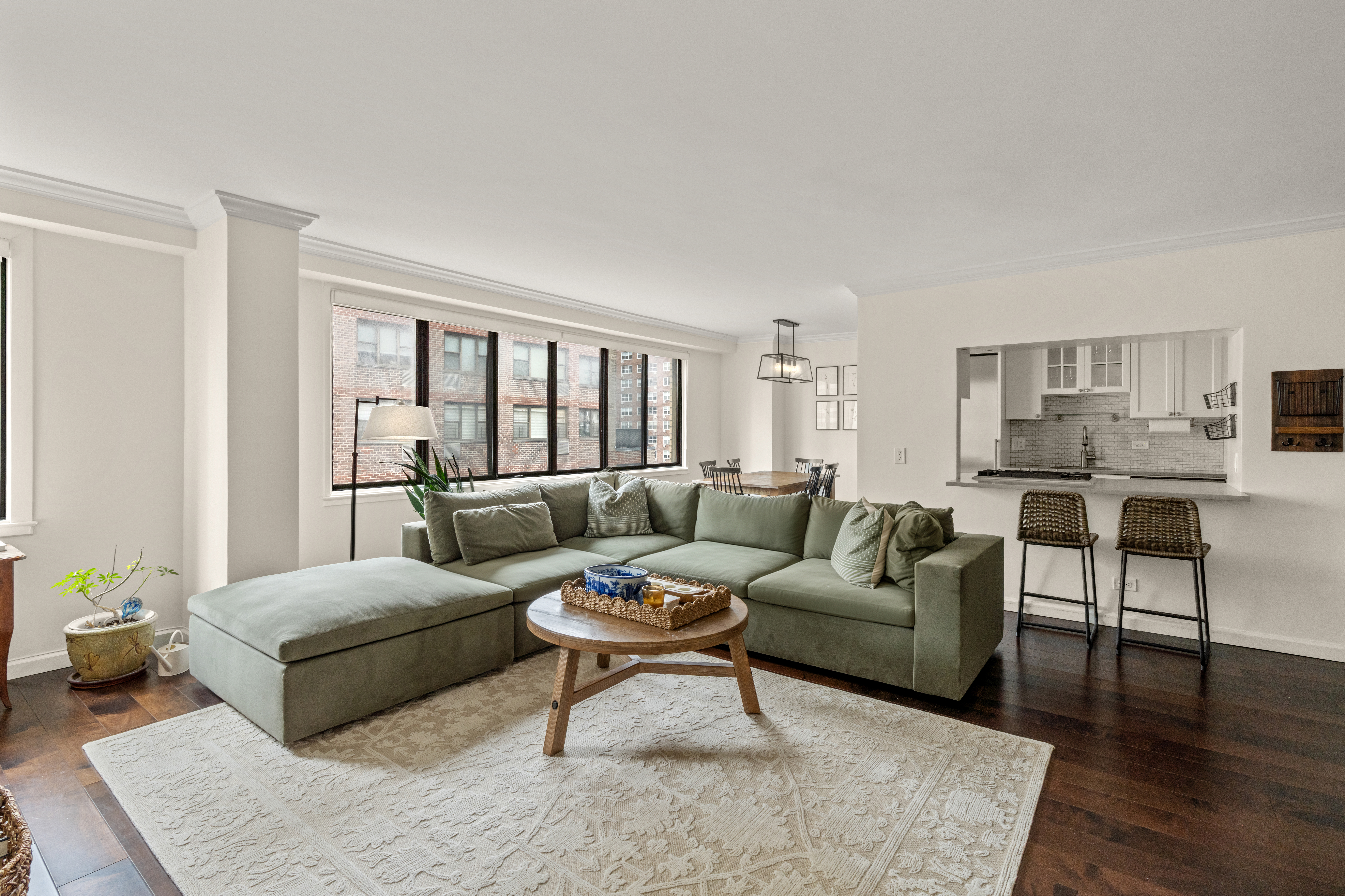 a living room with furniture and a table