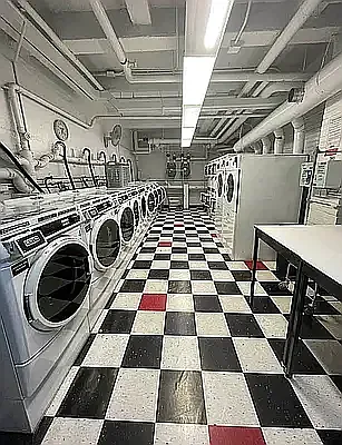 457 West 57th Street, Unit 1712 Manhattan, NY 10019 - Photo 8 of 9 a black and white checkered floor