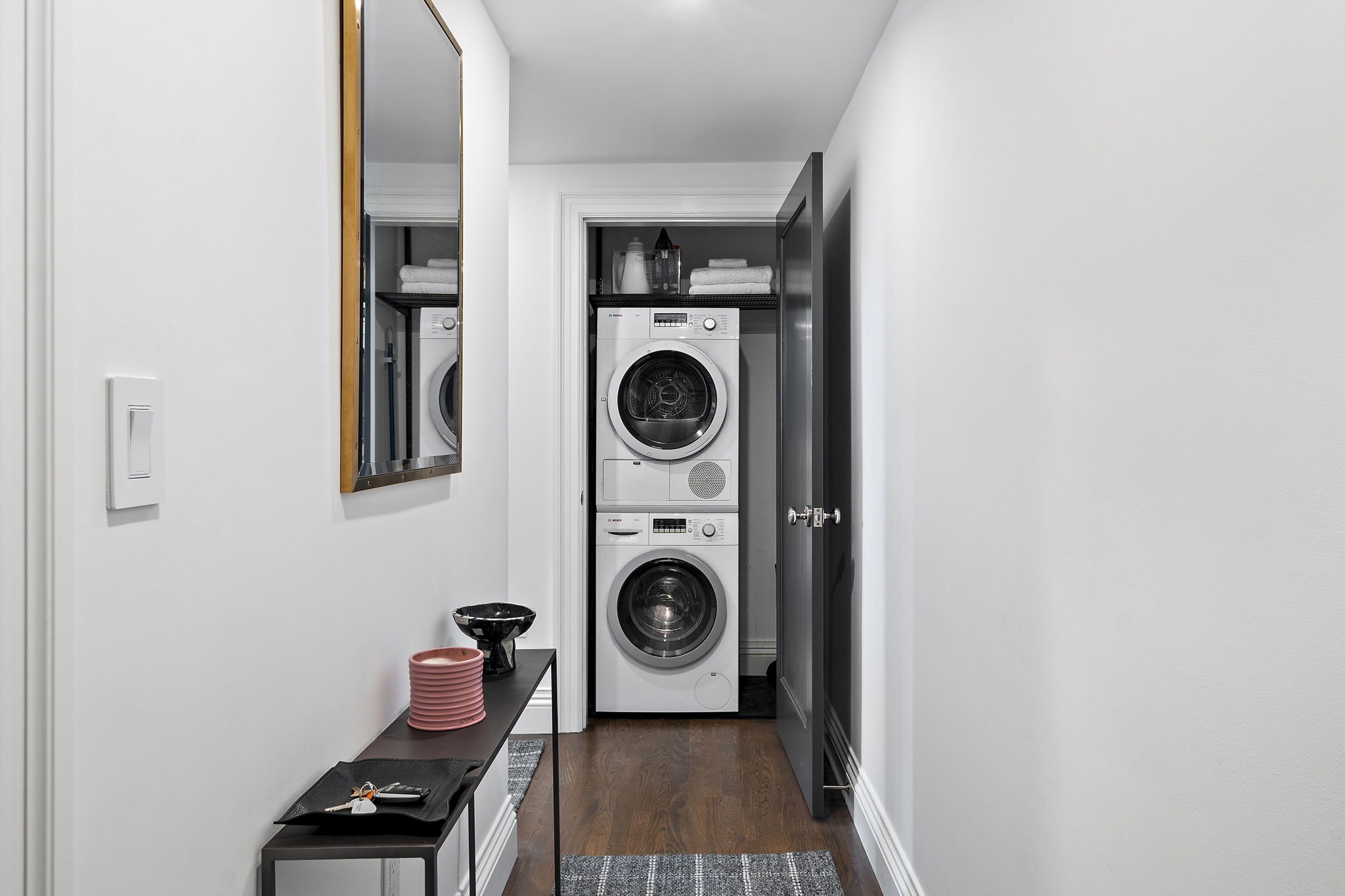 9 Appleton Street, Unit 302 Boston, MA 02116 - Photo 9 of 10 a utility room with dryer washer and a view of living room