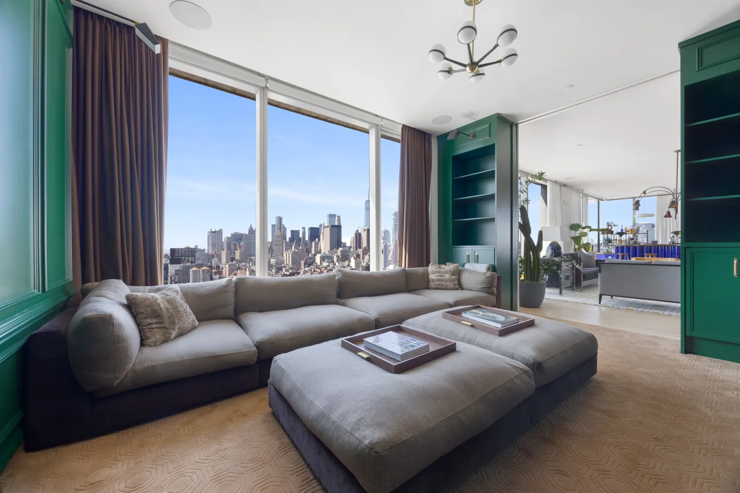 a room with pool table and windows